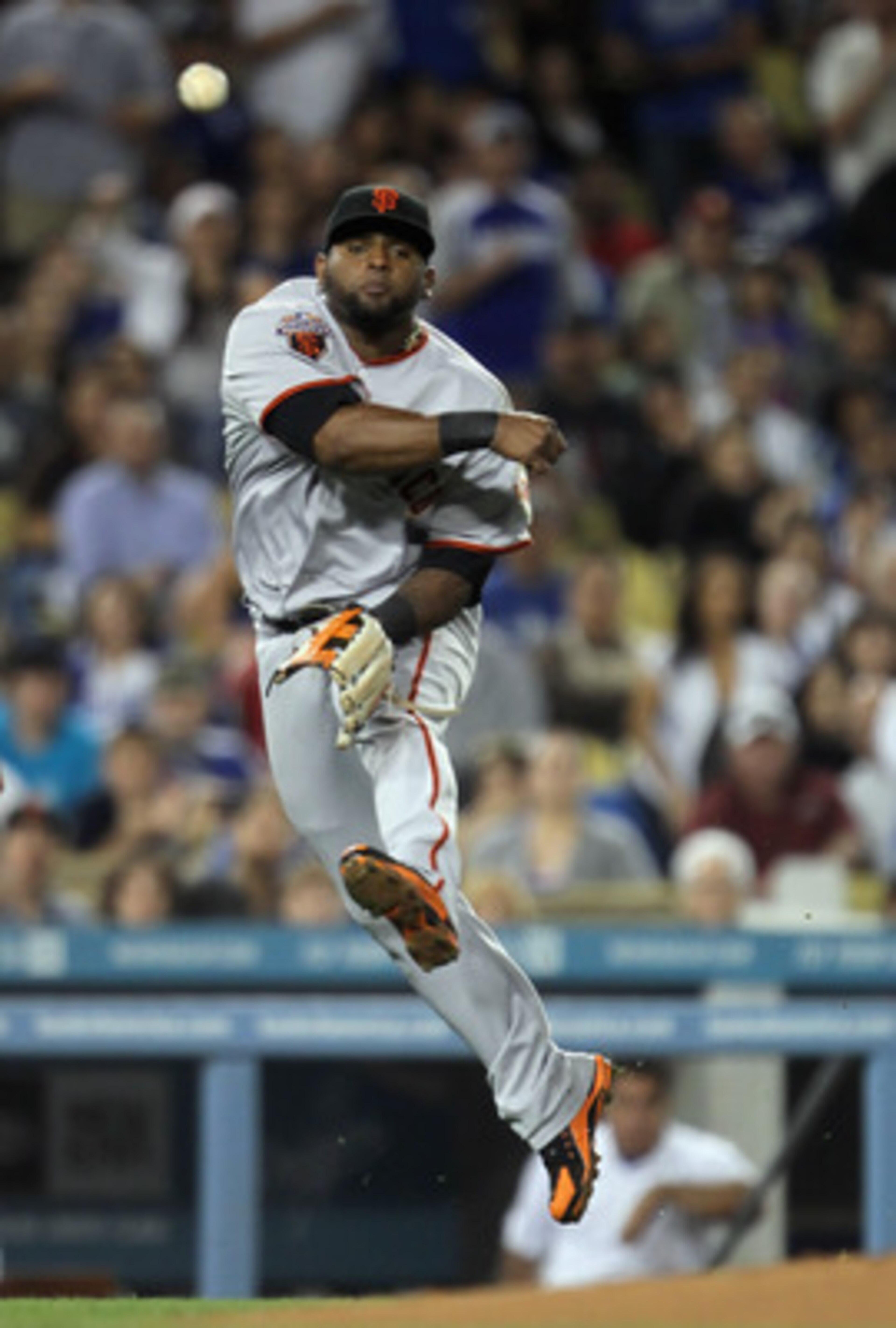 LOS ANGELES, CA - APRIL 01: Third baseman Pablo Sandoval #48 of the San Francisco Giants throws to first resulting in an error in the sixth inning against the Los Angeles Dodgers at Dodger Stadium on April 1, 2011 in Los Angeles, California. The Dodgers LOS ANGELES, CA - APRIL 01: Third baseman Pablo Sandoval #48 of the San Francisco Giants throws to first resulting in an error in the sixth inning against the Los Angeles Dodgers at Dodger Stadium on April 1, 2011 in Los Angeles, California. The Dodgers