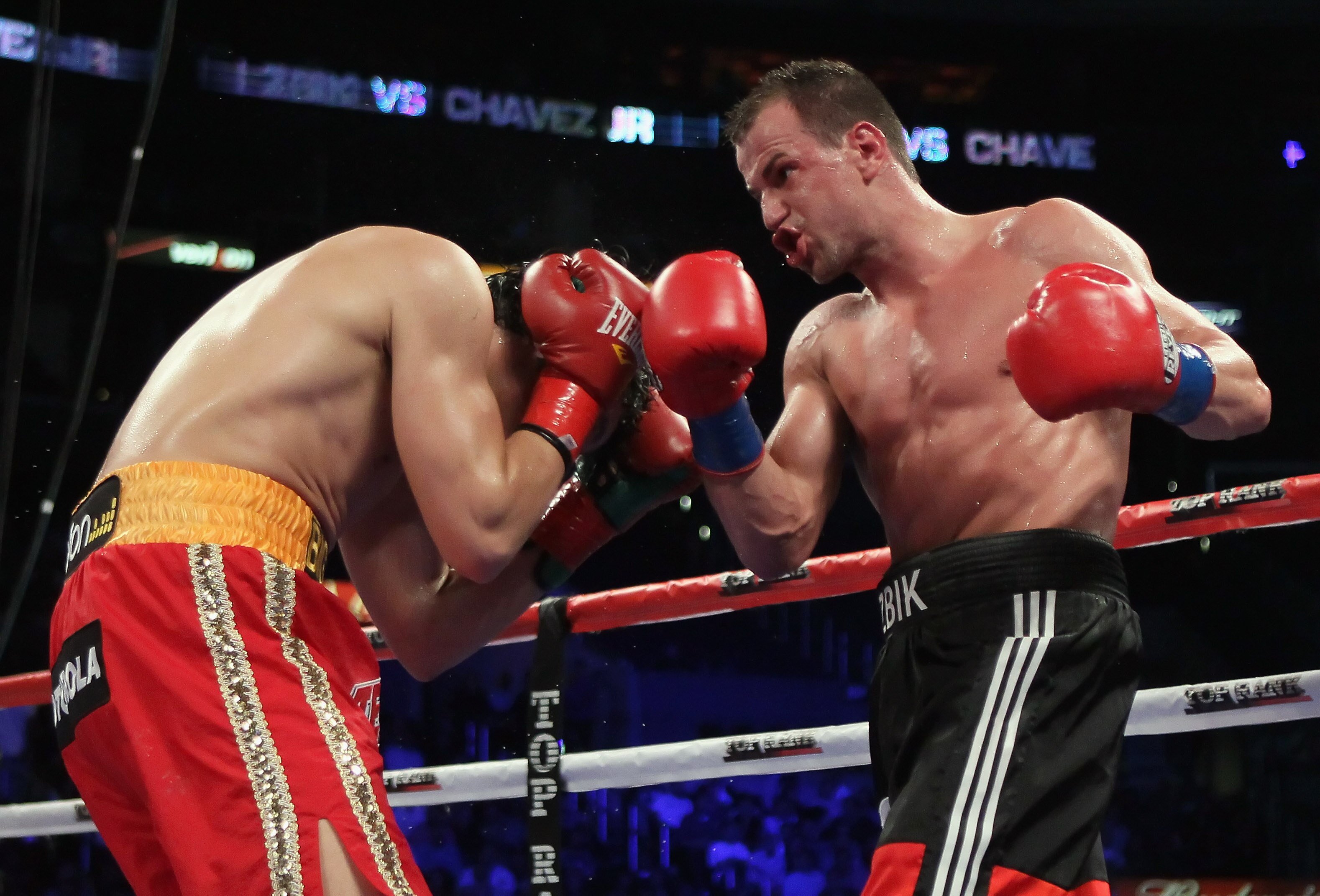 LOS ANGELES, CA - JUNE 04:  Sebastian Zbik of Germany (R) connects with Julio Cesar Chavez Jr. of Mexico during their WBC World Middleweight Title bout at Staples Center on June 4, 2011 in Los Angeles, California.  (Photo by Jeff Gross/Getty Images)