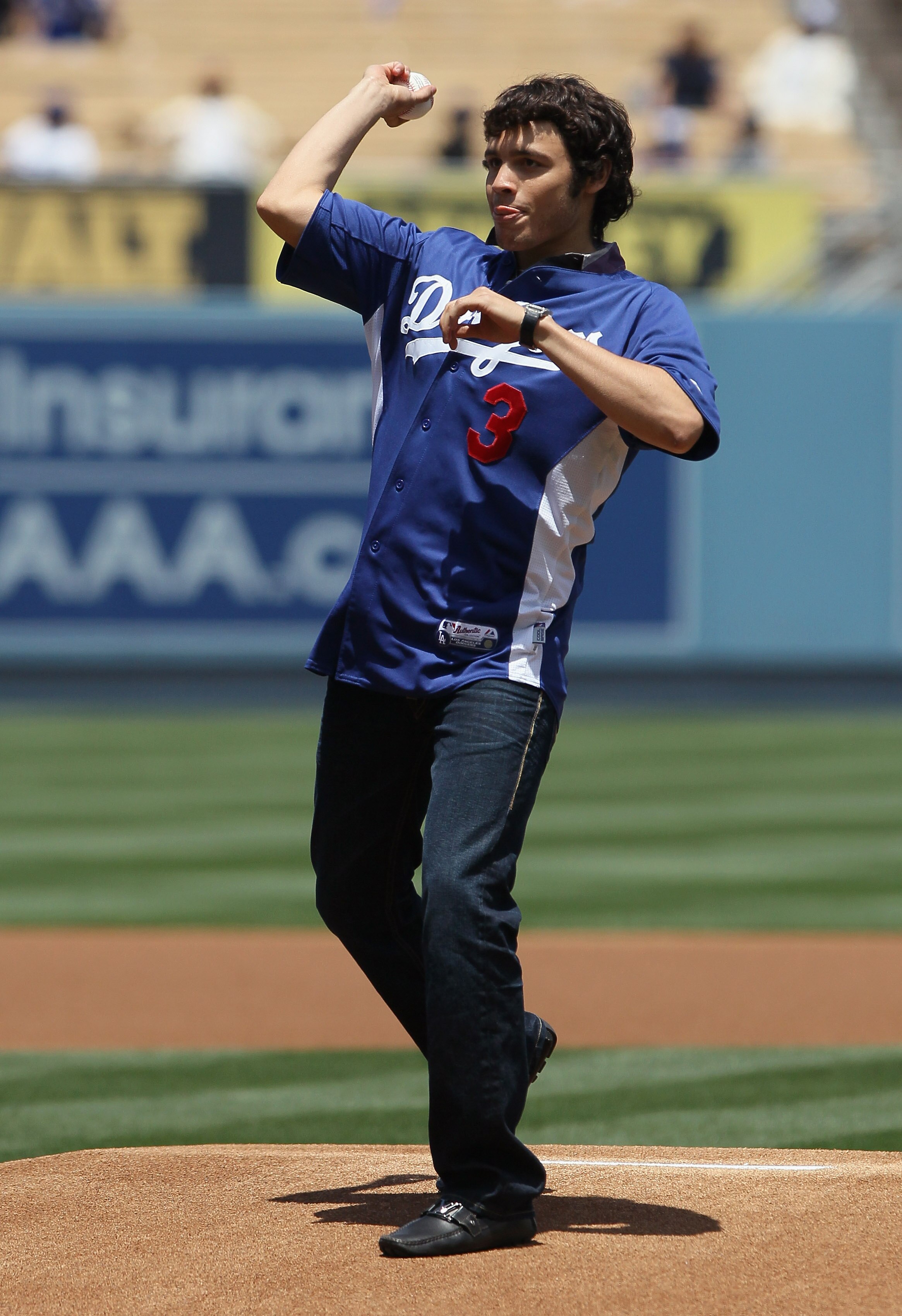 LOS ANGELES, CA - MAY 29:  Boxer Julio Cesar Chavez Jr. of Mexico throws out the first pitch prior to the start of the game between the Los Angeles Dodgers and the Florida Marlins at Dodger Stadium on May 29, 2011 in Los Angeles, California. The Dodgers d