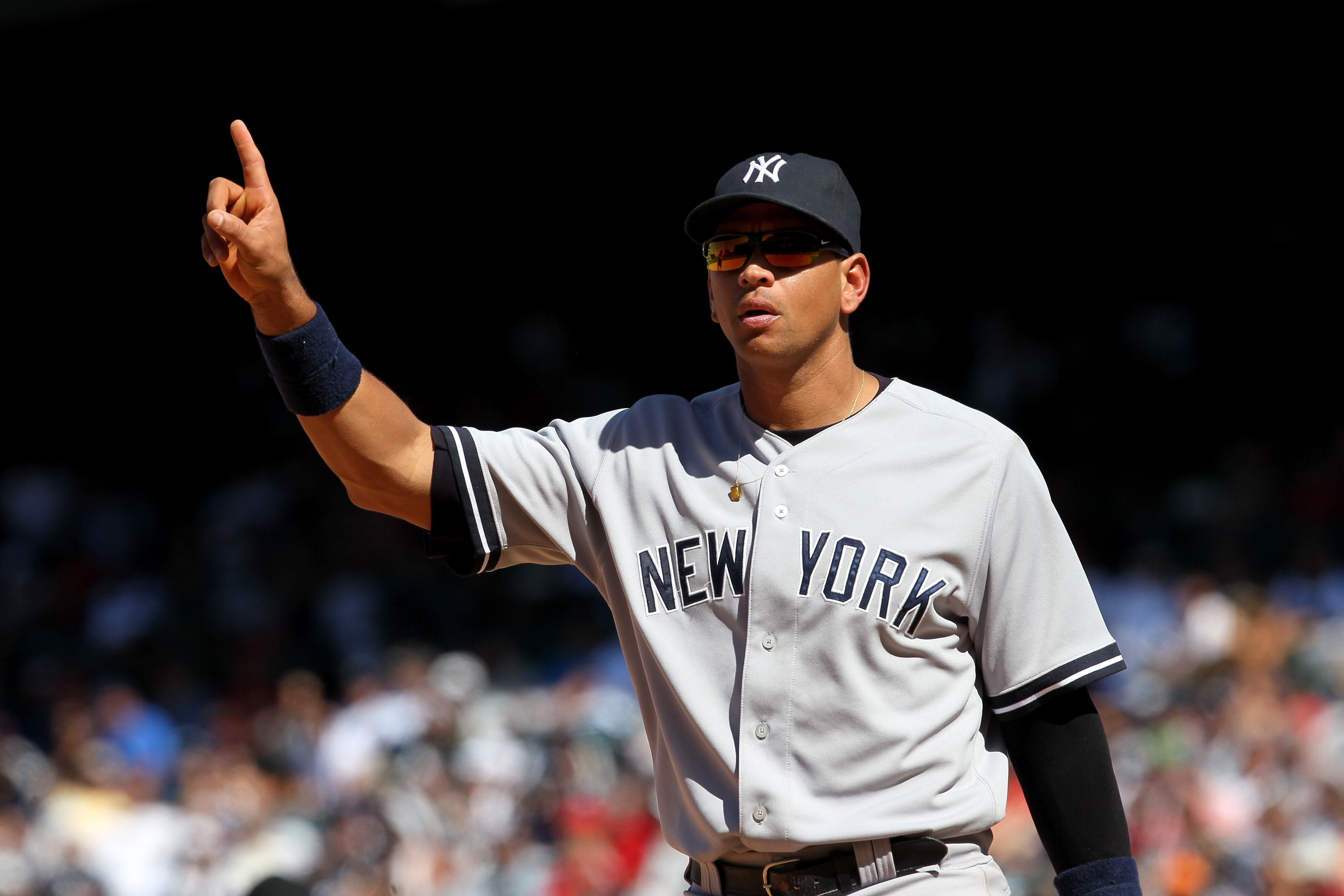 ANAHEIM, CA - JUNE 5:  Third baseman Alex Rodriguez #13 of the New York Yankees signals during the game against the Los Angeles Angels of Anaheim on June 5, 2011 at Angel Stadium in Anaheim, California.  The Yankees won 5-3.  (Photo by Stephen Dunn/Getty
