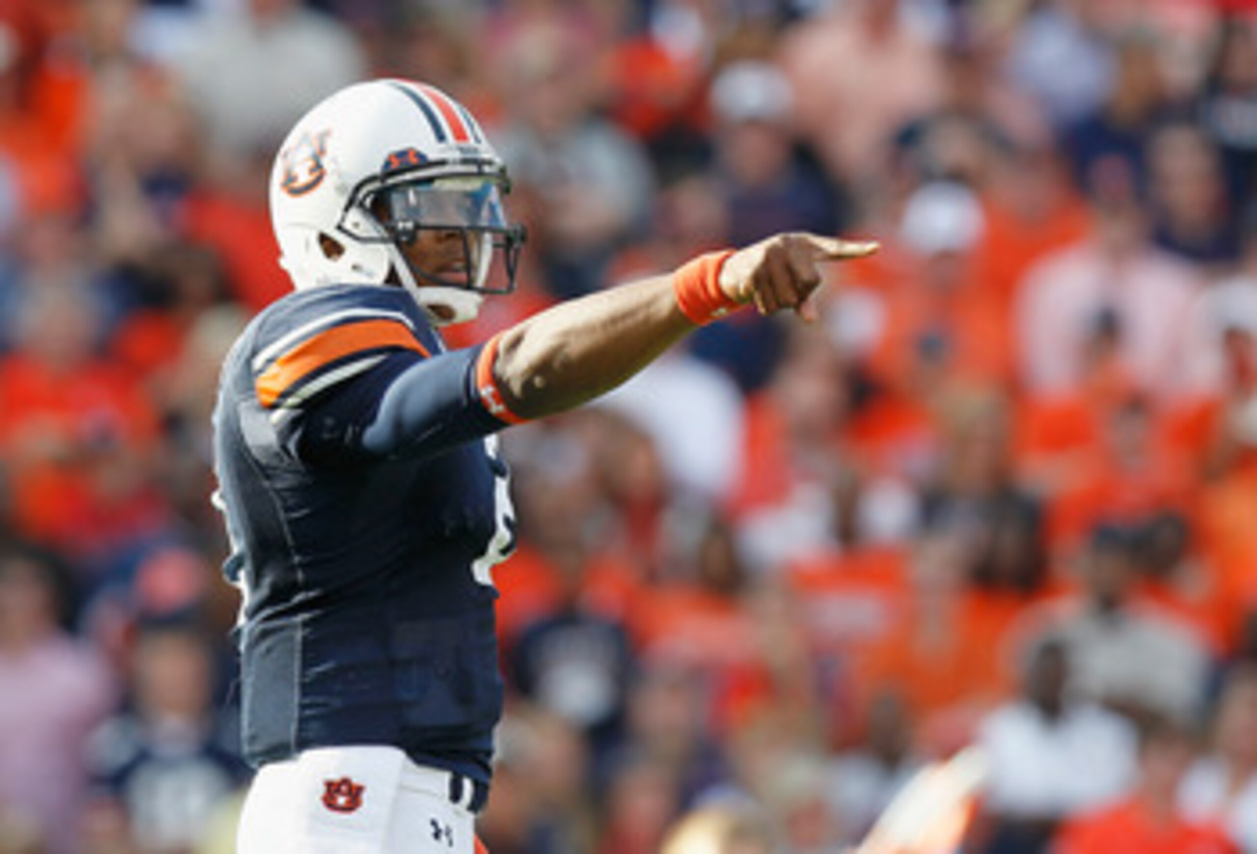 AUBURN, AL - NOVEMBER 13:  Quarterback Cameron Newton #2 of the Auburn Tigers points out the defense in the first offensive series against the Georgia Bulldogs at Jordan-Hare Stadium on November 13, 2010 in Auburn, Alabama.  (Photo by Kevin C. Cox/Getty I