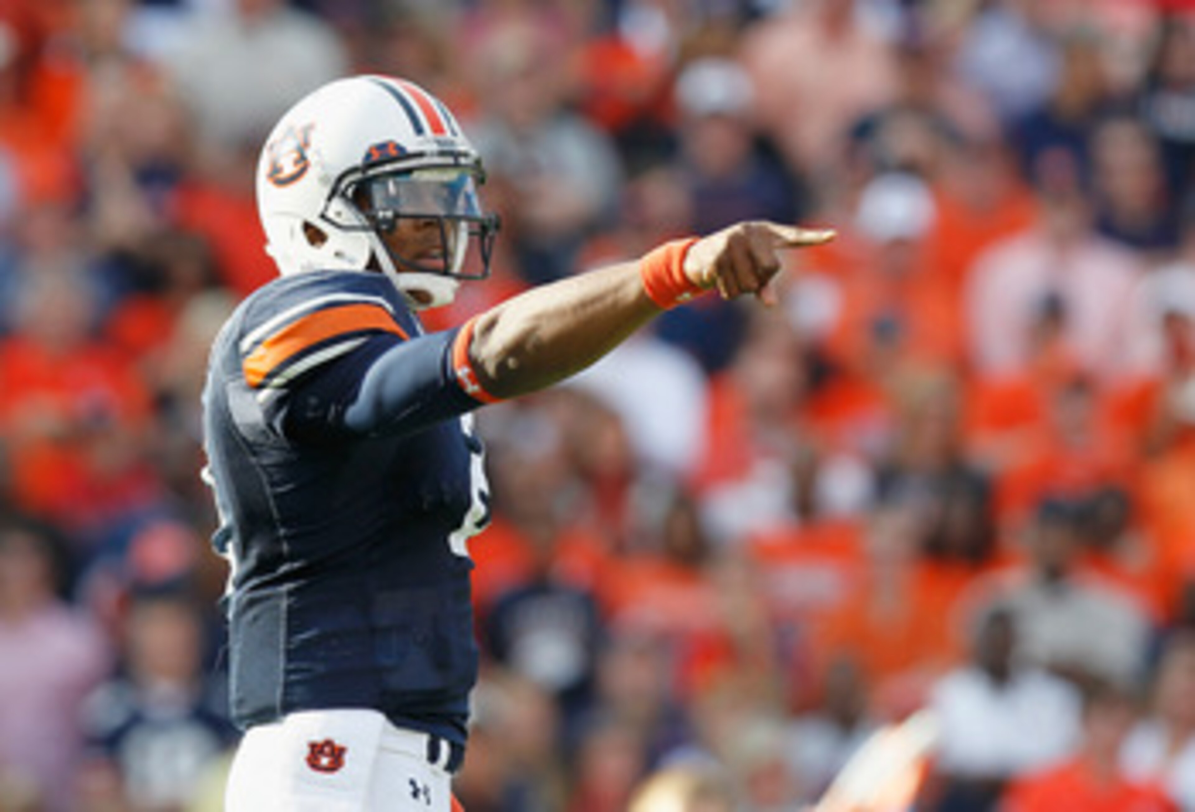 AUBURN, AL - NOVEMBER 13:  Quarterback Cameron Newton #2 of the Auburn Tigers points out the defense in the first offensive series against the Georgia Bulldogs at Jordan-Hare Stadium on November 13, 2010 in Auburn, Alabama.  (Photo by Kevin C. Cox/Getty I