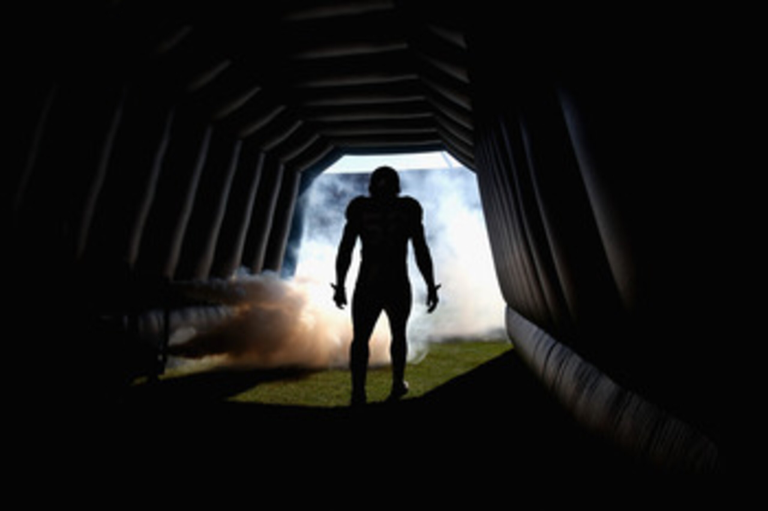 CHARLOTTE, NC - NOVEMBER 21:  Jon Beason #52 of the Carolina Panthers is introduced against the Baltimore Ravens at Bank of America Stadium on November 21, 2010 in Charlotte, North Carolina.  (Photo by Streeter Lecka/Getty Images)