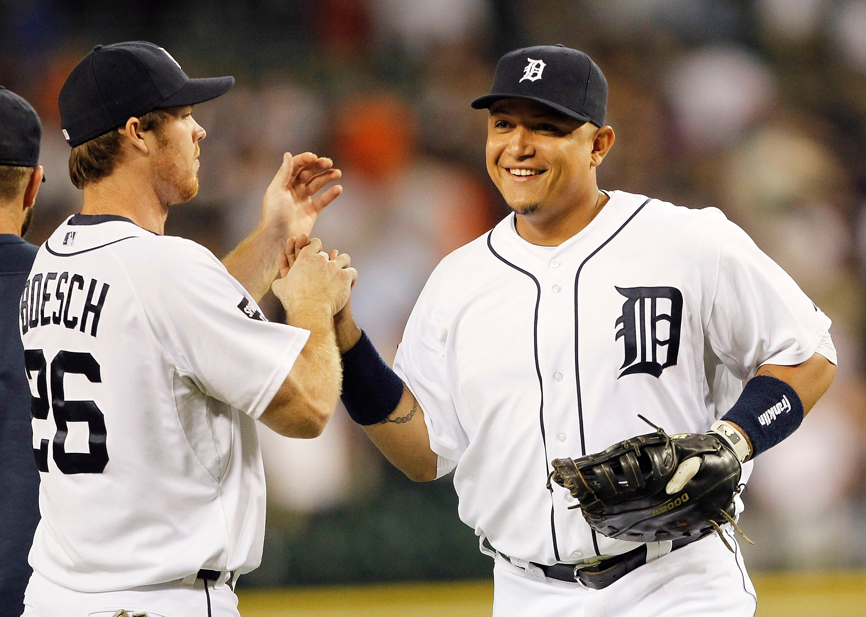 DETROIT - JUNE 01: Brennan Boesch #26 and Miguel Cabrera #24 of the Detroit Tigers celebrate a 4-2 win over the Minnesota Twins at Comerica Park on June 1, 2011 in Detroit, Michigan. (Photo by Leon Halip/Getty Images)
