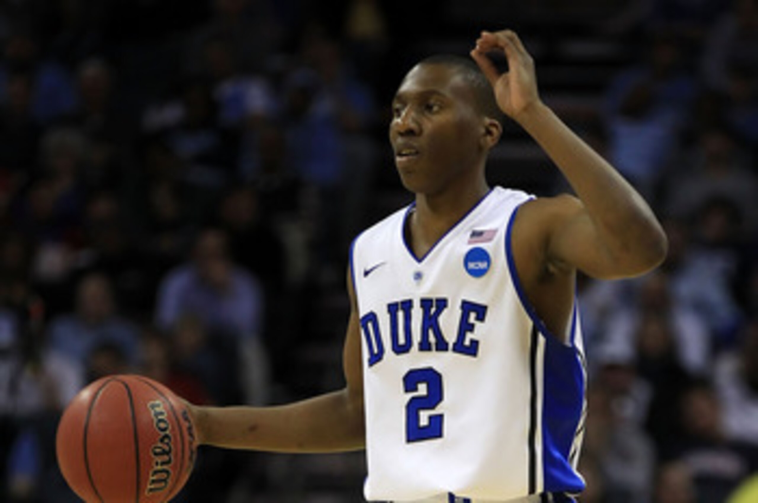 CHARLOTTE, NC - MARCH 20:  Nolan Smith #2 of the Duke Blue Devils moves the ball while taking on the Michigan Wolverines during the third round of the 2011 NCAA men's basketball tournament at Time Warner Cable Arena on March 20, 2011 in Charlotte, North C