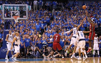 DALLAS, TX - JUNE 05:  LeBron James #6 of the Miami Heat shoots the ball over Tyson Chandler #6 and Shawn Marion #0 of the Dallas Mavericks in the third quarter in Game Three of the 2011 NBA Finals at American Airlines Center on June 5, 2011 in Dallas, Te
