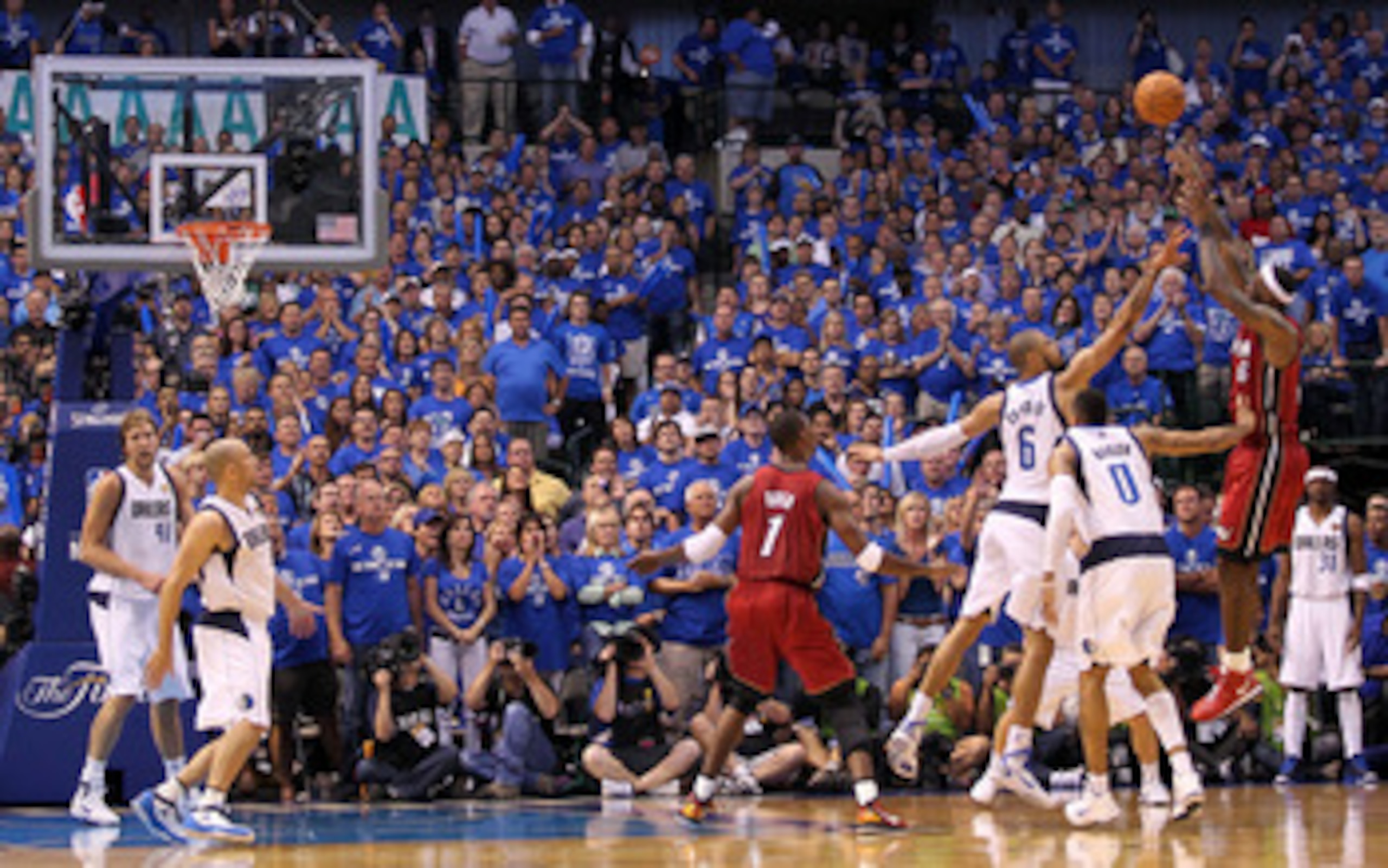 DALLAS, TX - JUNE 05:  LeBron James #6 of the Miami Heat shoots the ball over Tyson Chandler #6 and Shawn Marion #0 of the Dallas Mavericks in the third quarter in Game Three of the 2011 NBA Finals at American Airlines Center on June 5, 2011 in Dallas, Te