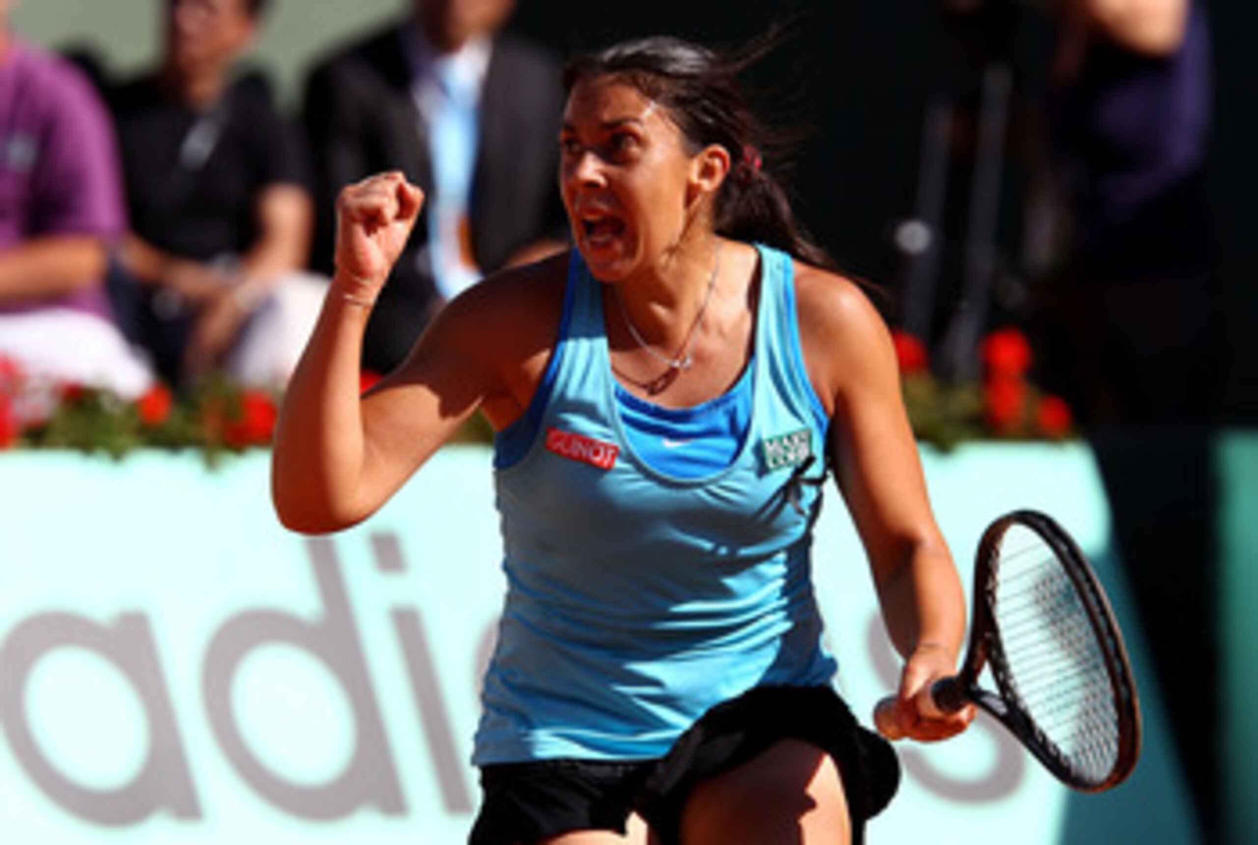 PARIS, FRANCE - JUNE 02:  Marion Bartoli of France celebrates a point during the women's singles semi final match between Marion Bartoli of France and Francesca Schiavone of Italy on day twelve of the French Open at Roland Garros on June 2, 2011 in Paris,