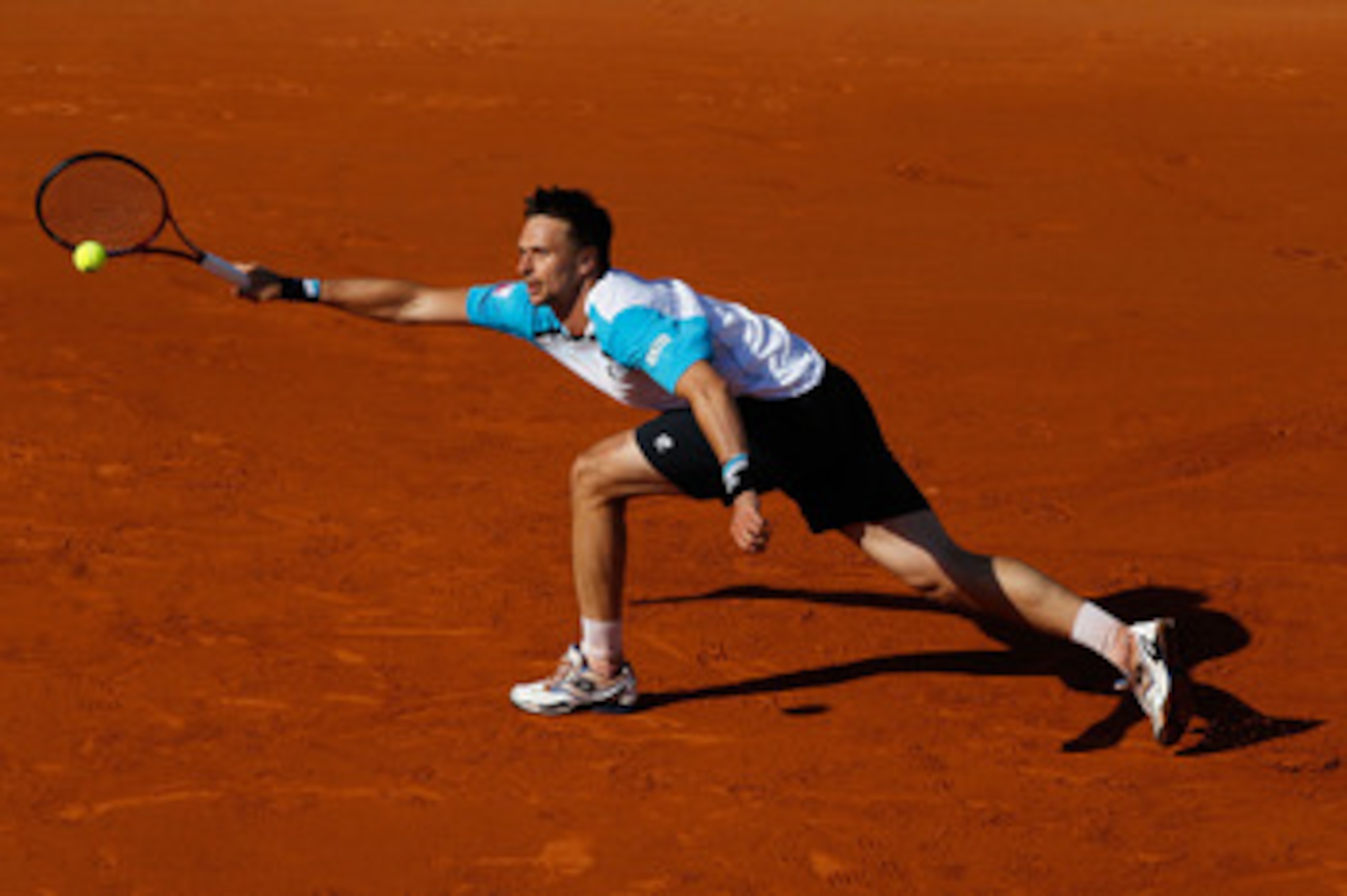PARIS, FRANCE - JUNE 01:  Robin Soderling of Sweden hits a forehand during the men's singles quarterfinal match between Rafael Nadal of Spain and Robin Soderling of Sweden on day eleven of the French Open at Roland Garros on June 1, 2011 in Paris, France.
