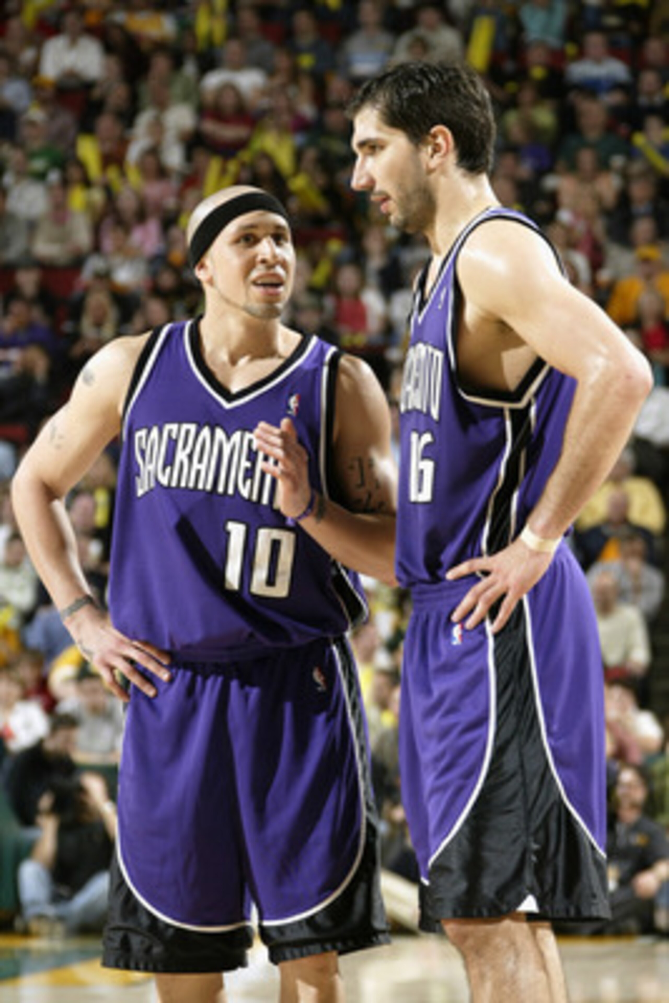 SEATTLE - MAY 3:  Mike Bibby #10 of the Sacramento Kings talks to his teammate Peja Stojakovic #16 in Game five of the Western Conference Quarterfinals against the Seattle Sonics during the 2005 NBA Playoffs at Key Arena on May 3, 2005 in Seattle, Washing