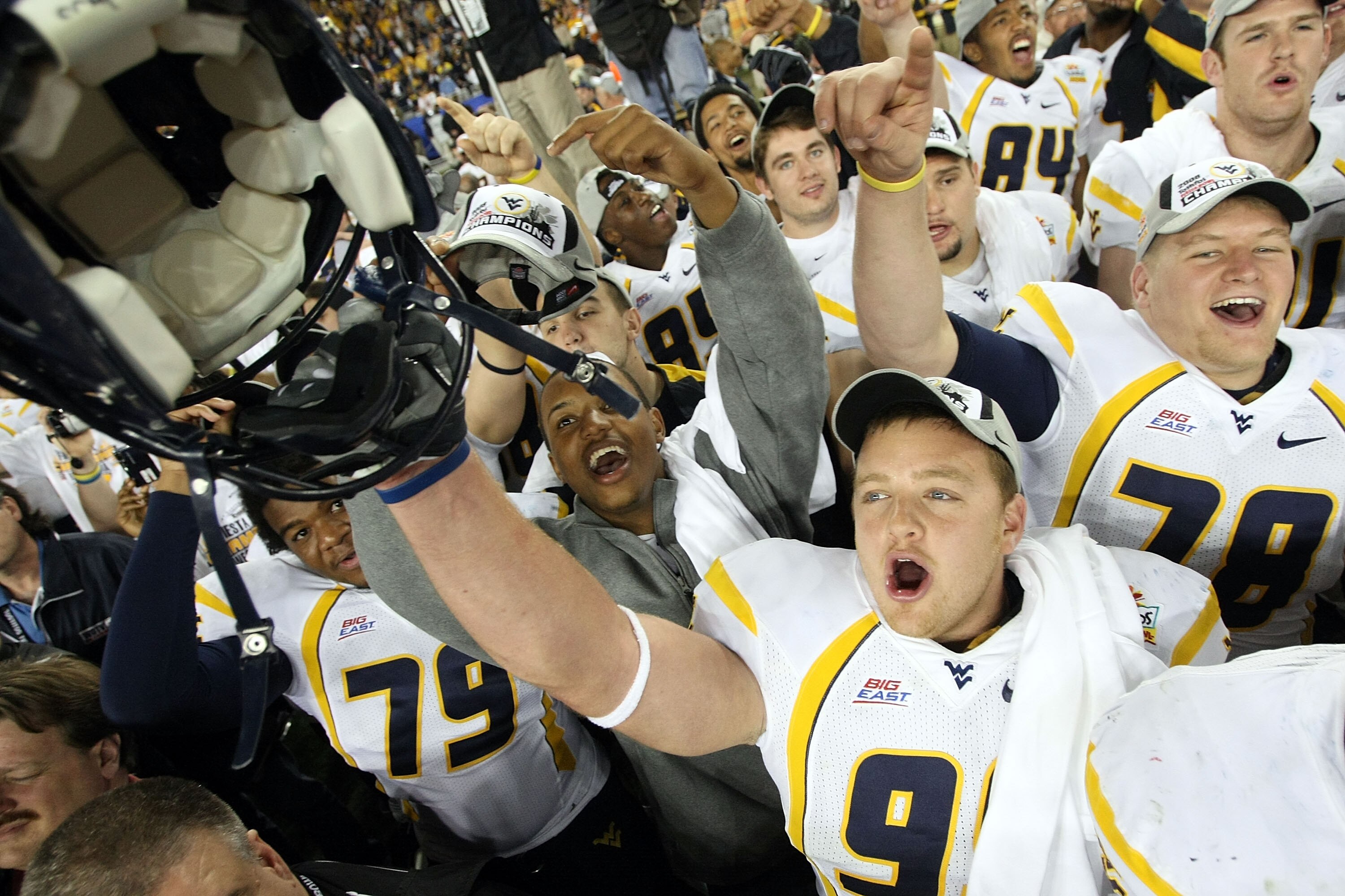 GLENDALE, AZ - JANUARY 02:  Defensive lineman Chris Neild #90 of the West Virginia Mountaineers celebrates after the Mountaineers defeated the Oklahoma Sooners 48-28 after the Tostito's Fiesta Bowl at University of Phoenix Stadium January 2, 2008 in Glend