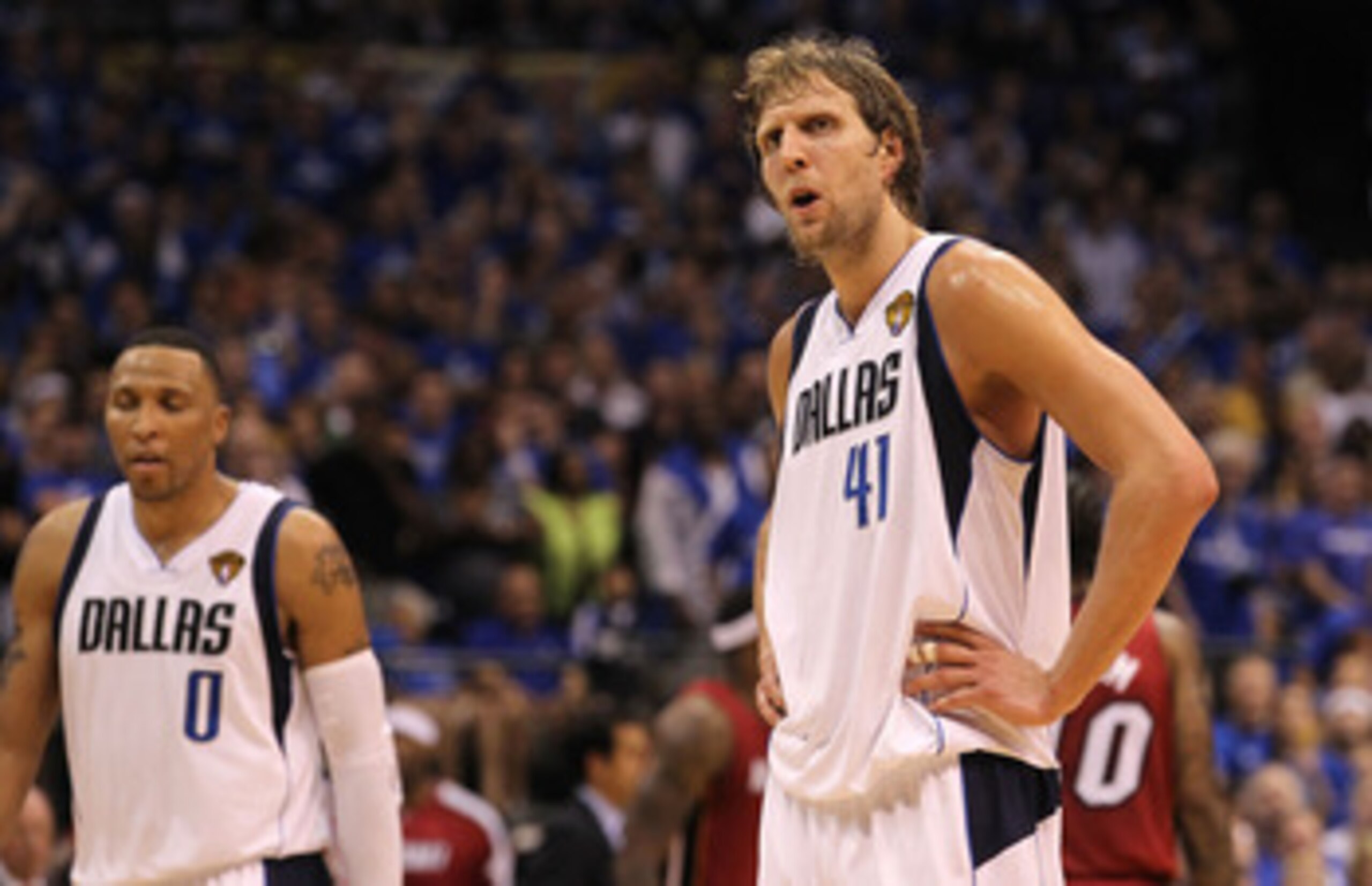 DALLAS, TX - JUNE 05:  (L-R) Shawn Marion #0 and Dirk Nowitzki #41 of the Dallas Mavericks look on while taking on the Miami Heat in Game Three of the 2011 NBA Finals at American Airlines Center on June 5, 2011 in Dallas, Texas. The Heat won 88-86. NOTE T