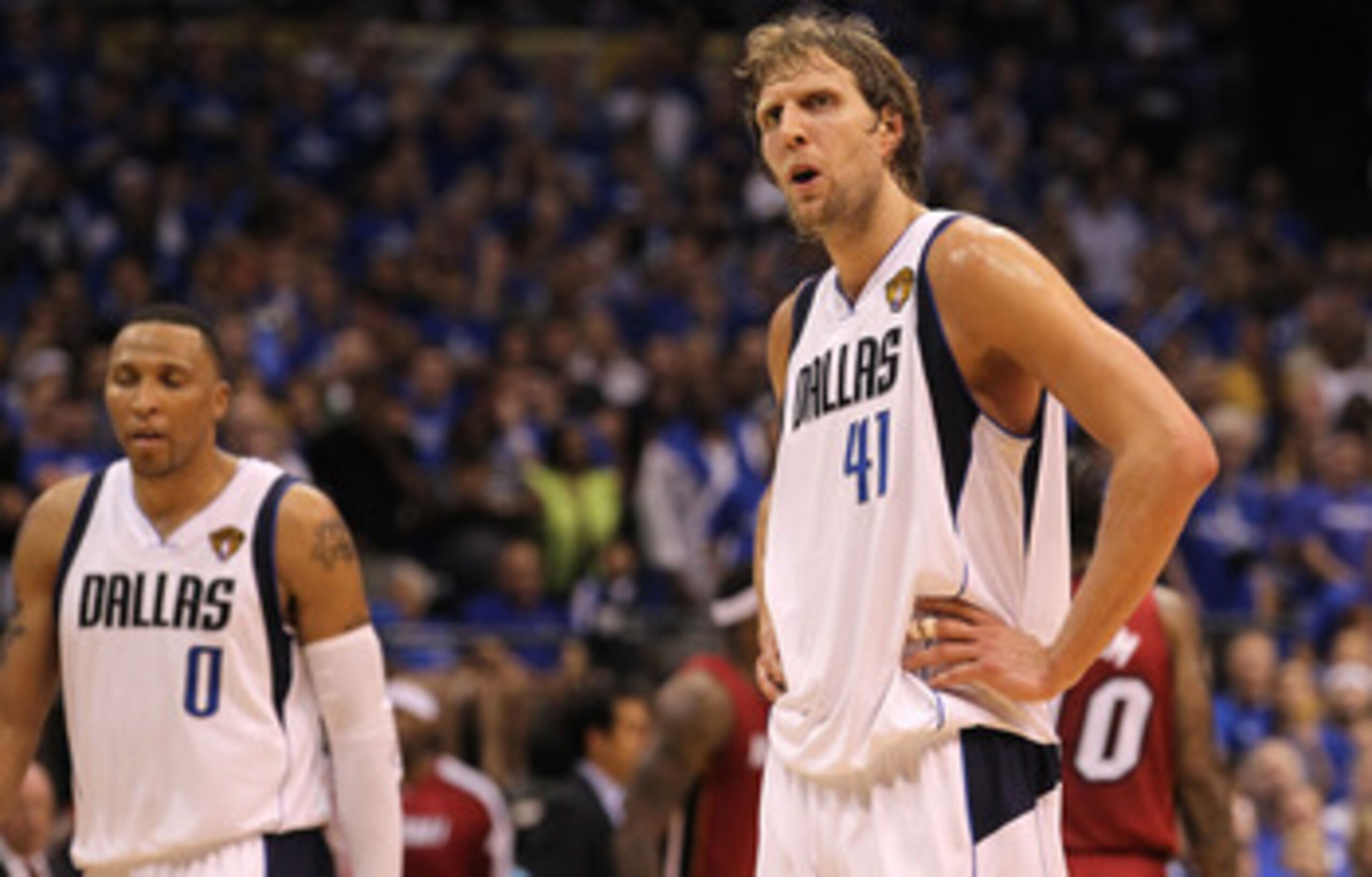 DALLAS, TX - JUNE 05:  (L-R) Shawn Marion #0 and Dirk Nowitzki #41 of the Dallas Mavericks look on while taking on the Miami Heat in Game Three of the 2011 NBA Finals at American Airlines Center on June 5, 2011 in Dallas, Texas. The Heat won 88-86. NOTE T