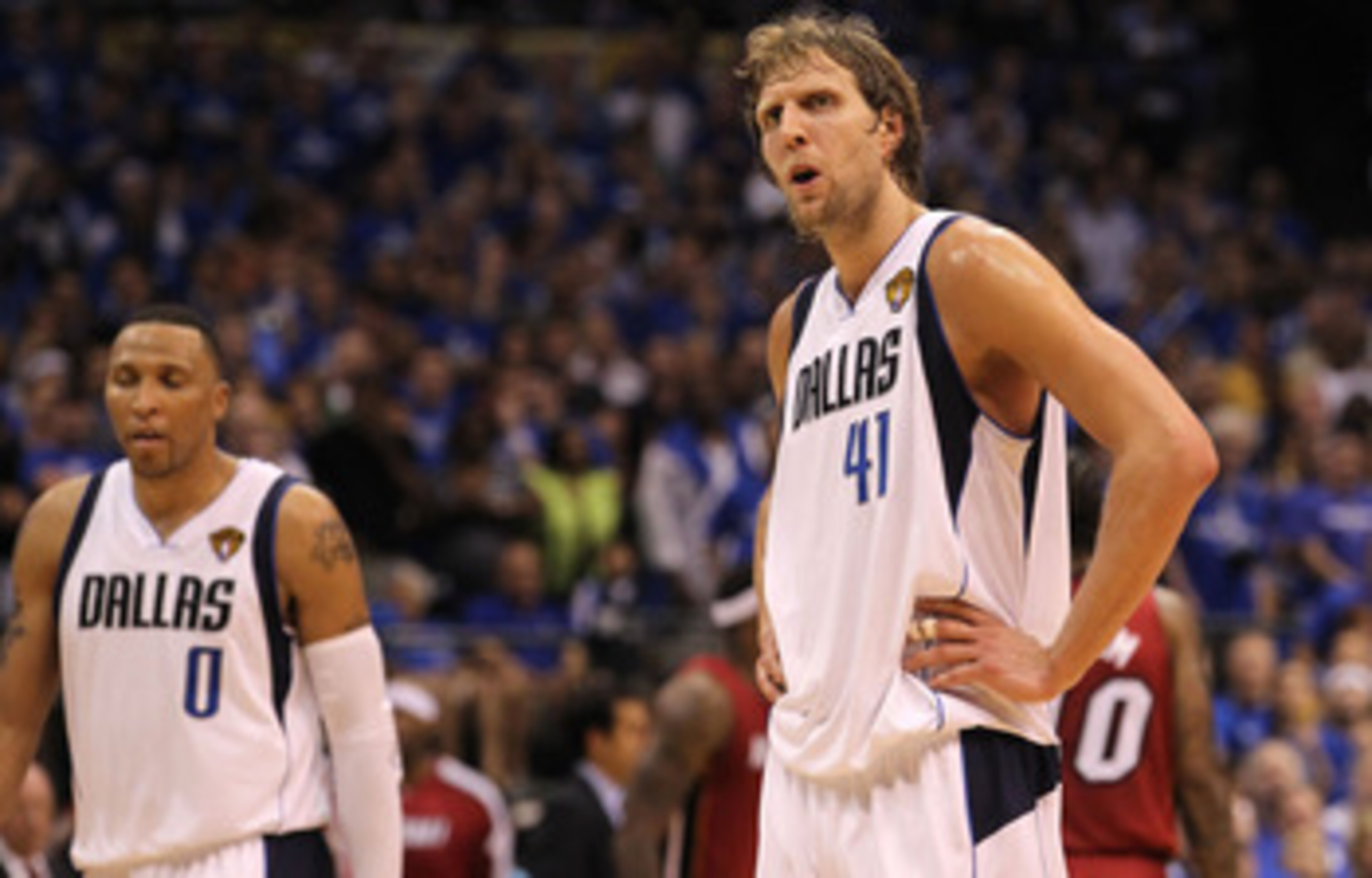 DALLAS, TX - JUNE 05:  (L-R) Shawn Marion #0 and Dirk Nowitzki #41 of the Dallas Mavericks look on while taking on the Miami Heat in Game Three of the 2011 NBA Finals at American Airlines Center on June 5, 2011 in Dallas, Texas. The Heat won 88-86. NOTE T