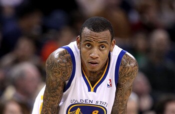 OAKLAND, CA - JANUARY 24:  Monta Ellis #8 of the Golden State Warriors in action against the San Antonio Spurs at Oracle Arena on January 24, 2011 in Oakland, California.  NOTE TO USER: User expressly acknowledges and agrees that, by downloading and or us