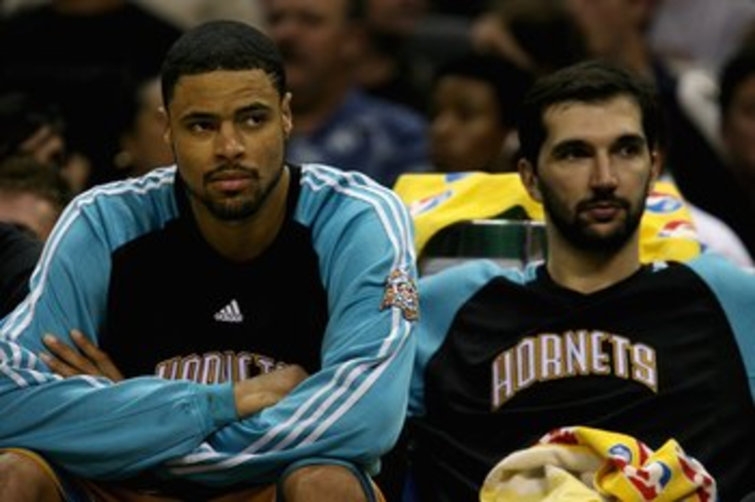 SAN ANTONIO - MAY 15:  Tyson Chandler #6 and Peja Stojakovic #16 of the New Orleans Hornets sit on the bench during the Hornets' loss to the San Antonio Spurs in Game Six of the Western Conference Semifinals during the 2008 NBA Playoffs on May 15, 2008 at