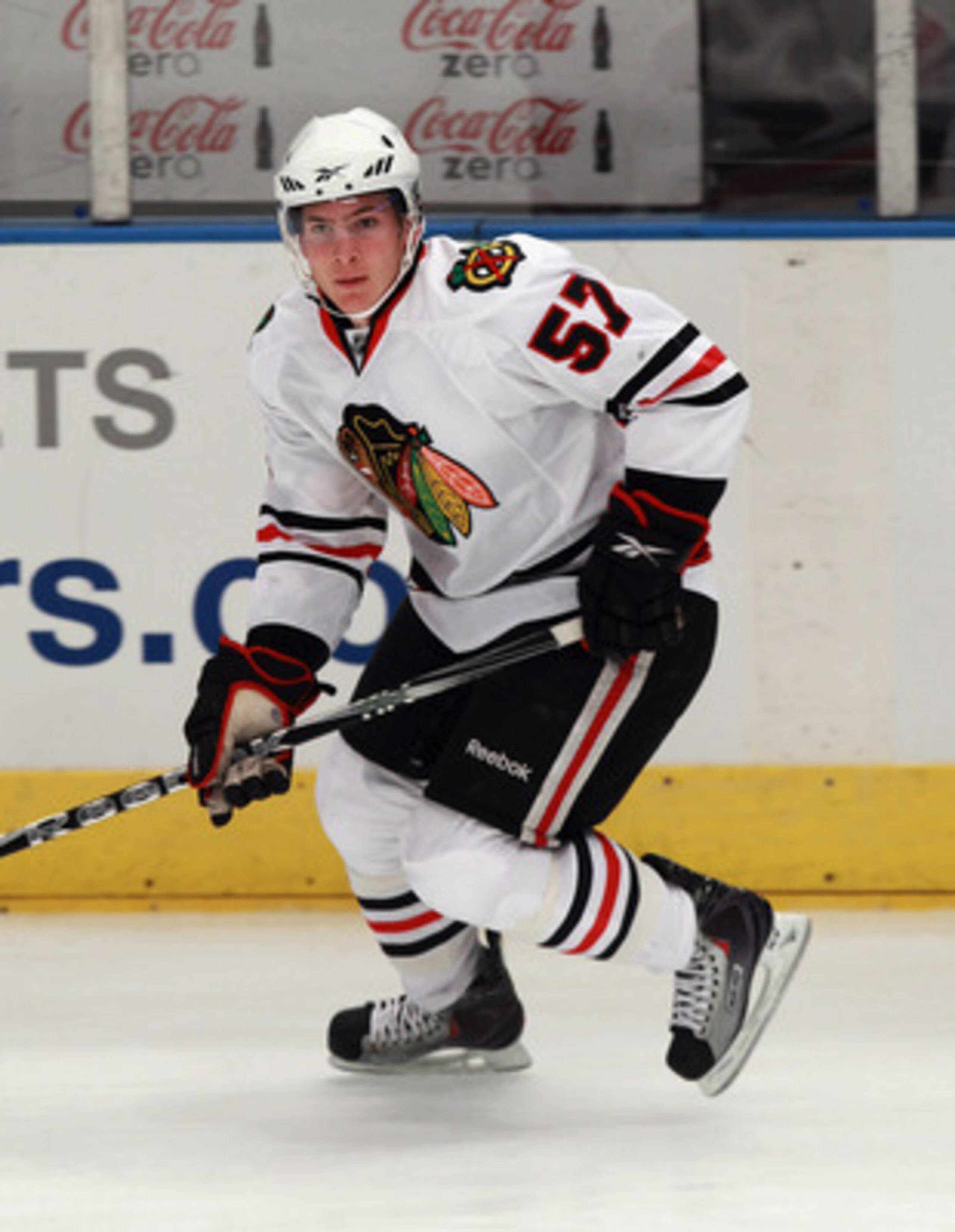 NEW YORK - NOVEMBER 01:  Ben Smith #57 of the Chicago Blackhawks skates against the New York Rangers at Madison Square Garden on November 1, 2010 in New York City. The Rangers defeated the Blackhawks 3-2.  (Photo by Bruce Bennett/Getty Images)