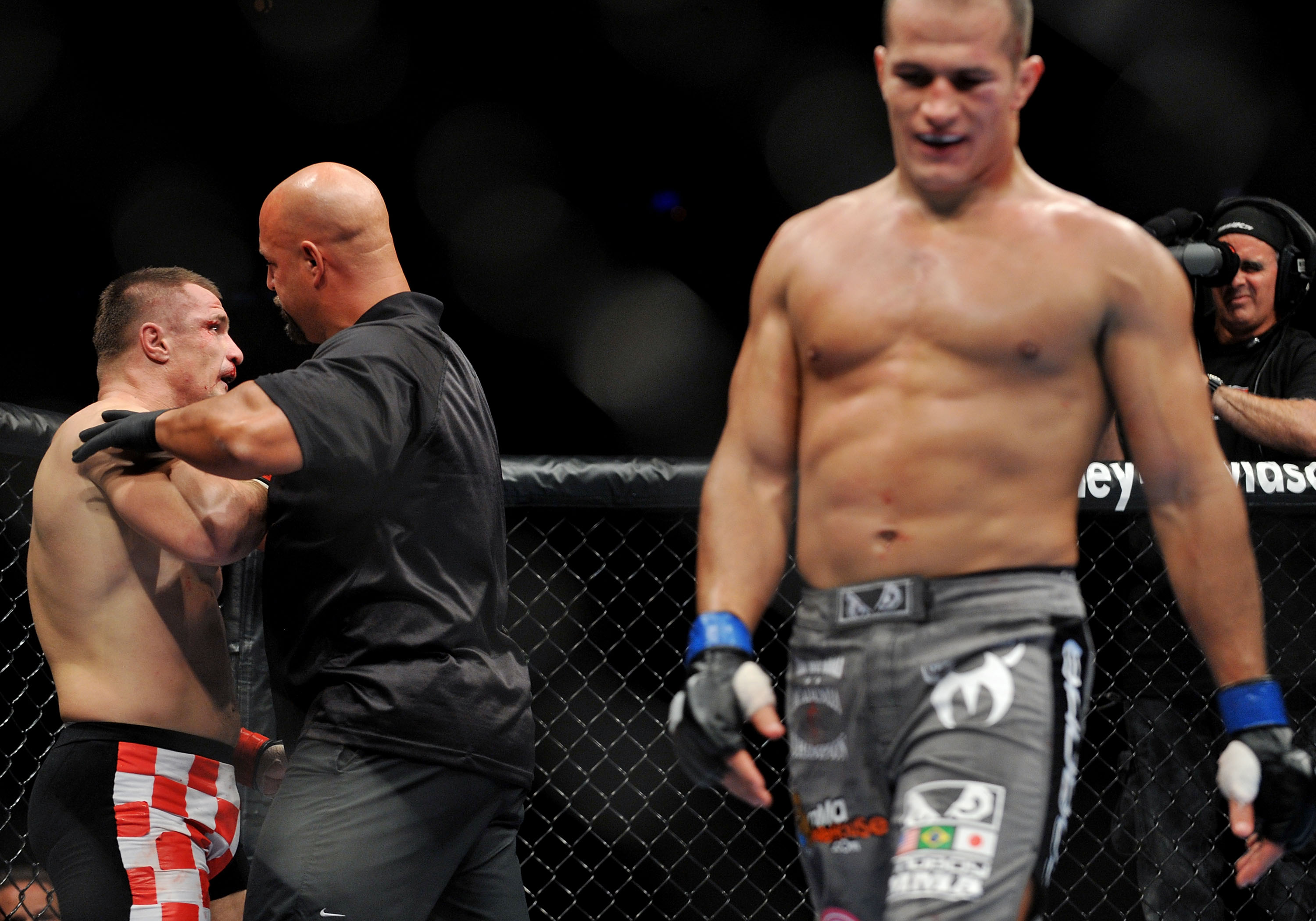 DALLAS - SEPTEMBER 19:  UFC fighter Mirko Cro Cop (L) is stopped by referee after losing to opponent UFC fighter Junior Dos Santo (R) during their Heavyweight bout at UFC 103: Franklin vs. Belfort at the American Airlines Center on September 19, 2009 in D