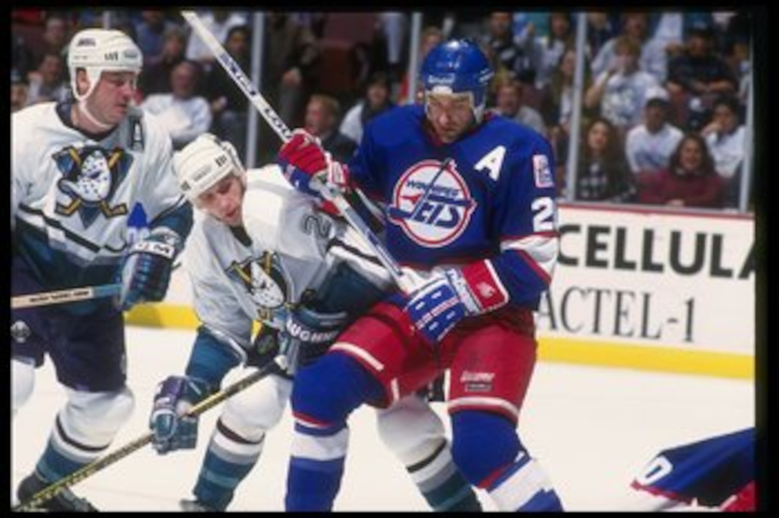 1 Dec 1993:  Bob Corkum of the Anaheim Mighty Ducks (left) and Dean Kennedy of the Winnipeg Jets fight during a game at Arrowhead Pond in Anaheim, California. Mandatory Credit: J.D. Cuban  /Allsport