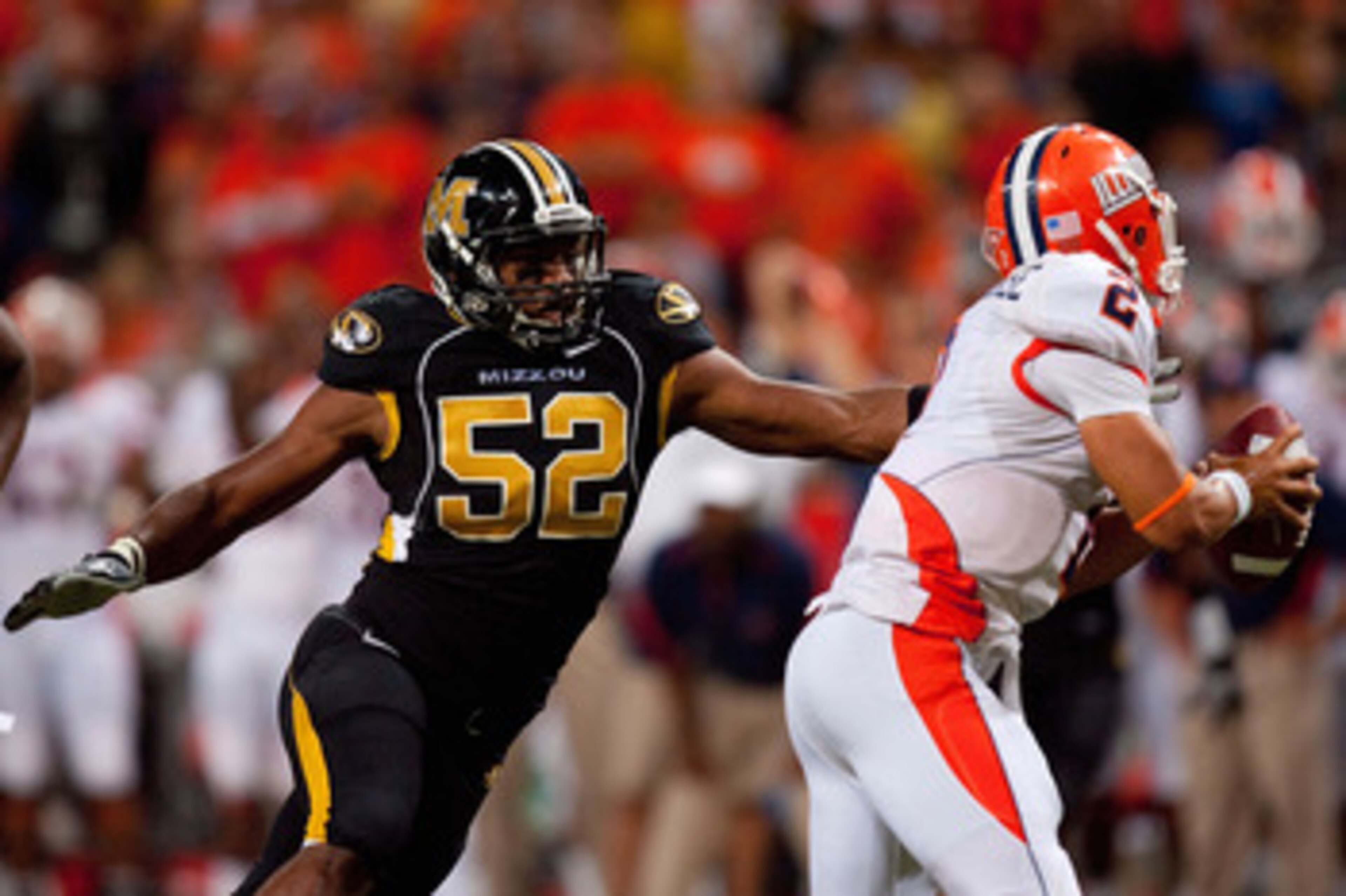 ST. LOUIS - SEPTEMBER 4: Michael Sam #52 of the University of Missouri Tigers looks to sack Nathan Scheelhaase #2 of the University of Illinois Fighting Illini during the State Farm Arch Rivalry game on September 4, 2010 at the Edward Jones Dome in St. Lo