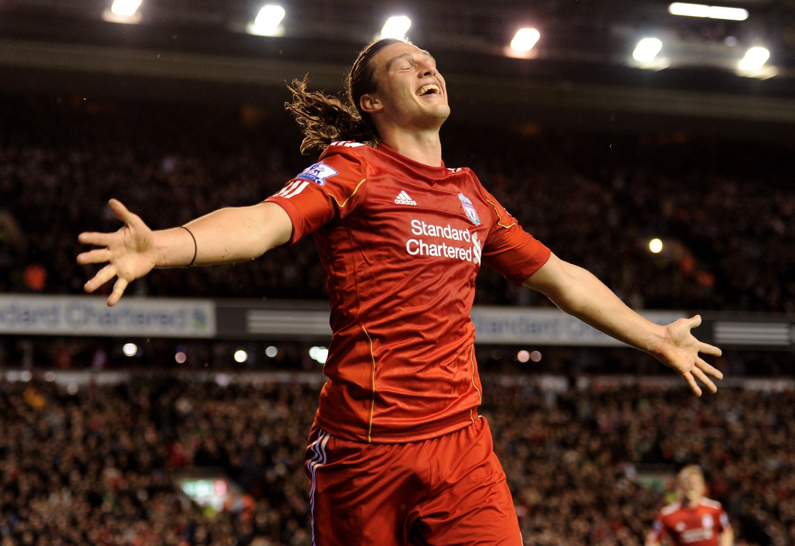 LIVERPOOL, ENGLAND - APRIL 11:  Andy Carroll of Liverpool celebrates scoring his team's third goal during the Barclays Premier League match between Liverpool and Manchester City at Anfield on April 11, 2011 in Liverpool, England.  (Photo by Michael Regan/