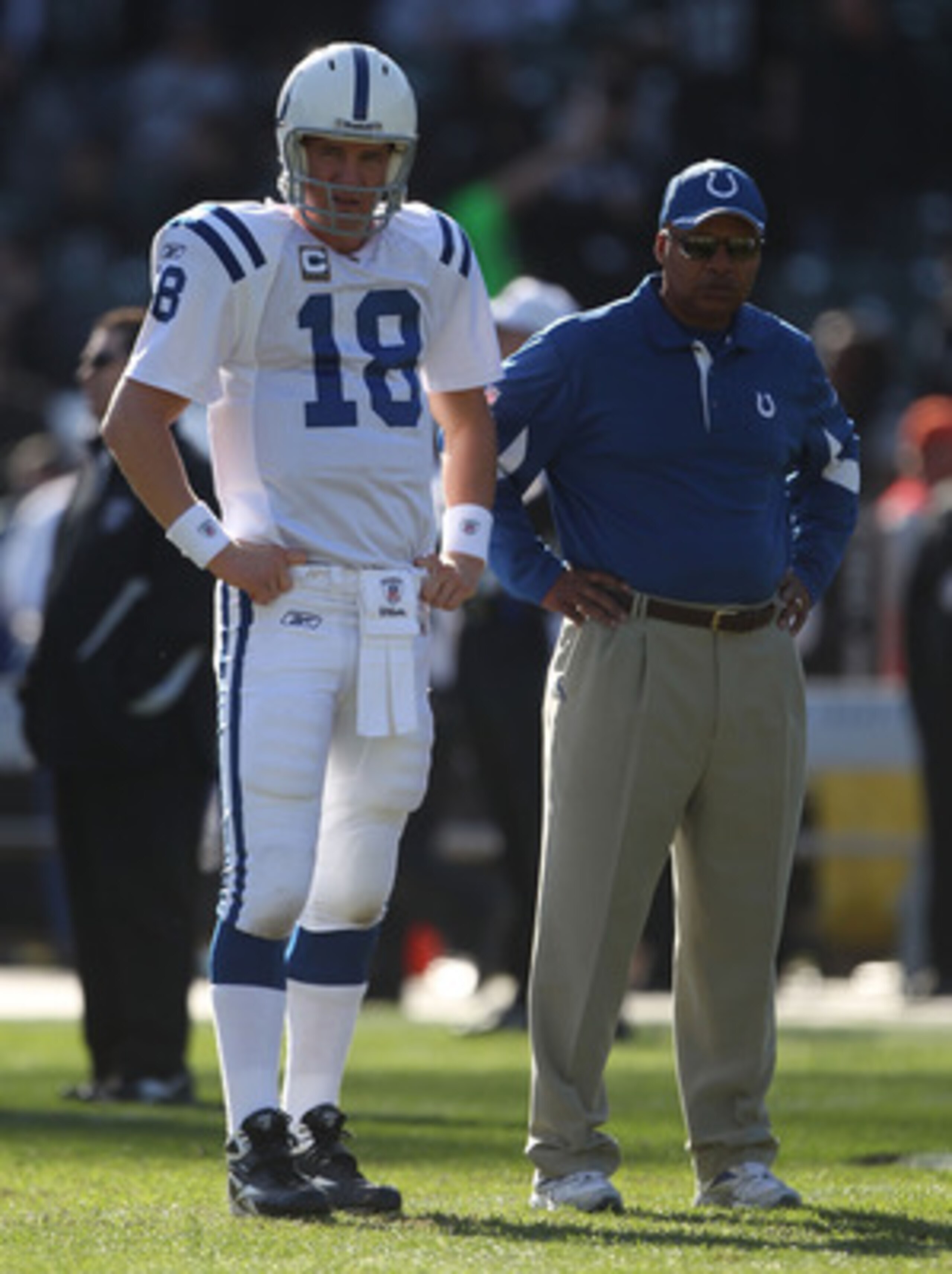 OAKLAND, CA - DECEMBER 26: Peyton Manning #18 of the Indianapolis Colts looks on with head coach Jim Caldwell against the Oakland Raiders during an NFL game at Oakland-Alameda County Coliseum on December 26, 2010 in Oakland, California. (Photo by Jed J OAKLAND, CA - DECEMBER 26: Peyton Manning #18 of the Indianapolis Colts looks on with head coach Jim Caldwell against the Oakland Raiders during an NFL game at Oakland-Alameda County Coliseum on December 26, 2010 in Oakland, California. (Photo by Jed J