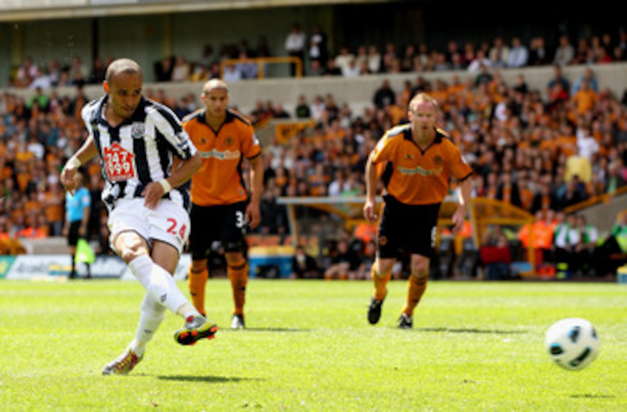 WOLVERHAMPTON, ENGLAND - MAY 08:  Peter Odemwingie of WBA scores their first goal from the penalty spot during the Barclays Premier League match between Wolverhampton Wanderers and West Bromwich Albion at Molineux on May 8, 2011 in Wolverhampton, England.