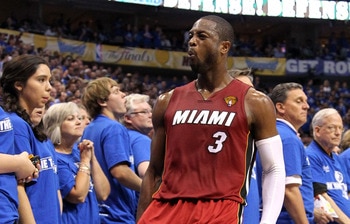 MIAMI, FL - JUNE 02:  Dirk Nowitzki #41 of the Dallas Mavericks attempts a shot against Dwyane Wade #3 of the Miami Heat in Game Two of the 2011 NBA Finals at American Airlines Arena on June 2, 2011 in Miami, Florida. NOTE TO USER: User expressly acknowle