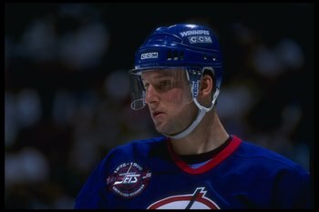 14 Apr 1996:  Center Craig Janney of the Winnipeg Jets looks on during a game against the Anaheim Mighty Ducks at Arrowhead Pond in Anaheim, California.  The Ducks won the game, 5-2. Mandatory Credit: Glenn Cratty  /Allsport
