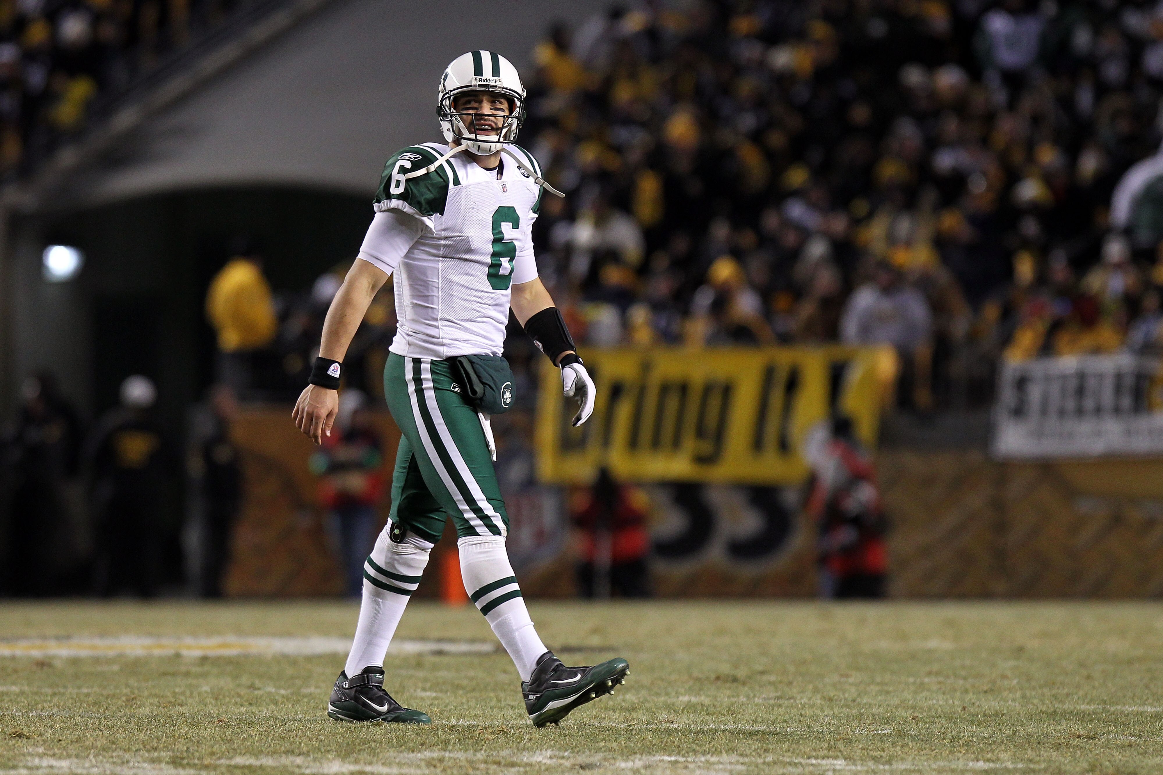 PITTSBURGH, PA - JANUARY 23:  Quarterback Mark Sanchez #6 of the New York Jets walks towards the sideline against the Pittsburgh Steelers during the 2011 AFC Championship game at Heinz Field on January 23, 2011 in Pittsburgh, Pennsylvania. The Steelers wo