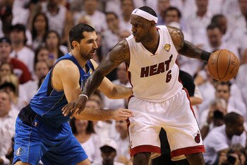 MIAMI, FL - MAY 31:  LeBron James #6 of the Miami Heat posts up Peja Stojakovic #16 of the Dallas Mavericks in the first quarter in Game One of the 2011 NBA Finals at American Airlines Arena on May 31, 2011 in Miami, Florida. NOTE TO USER: User expressly