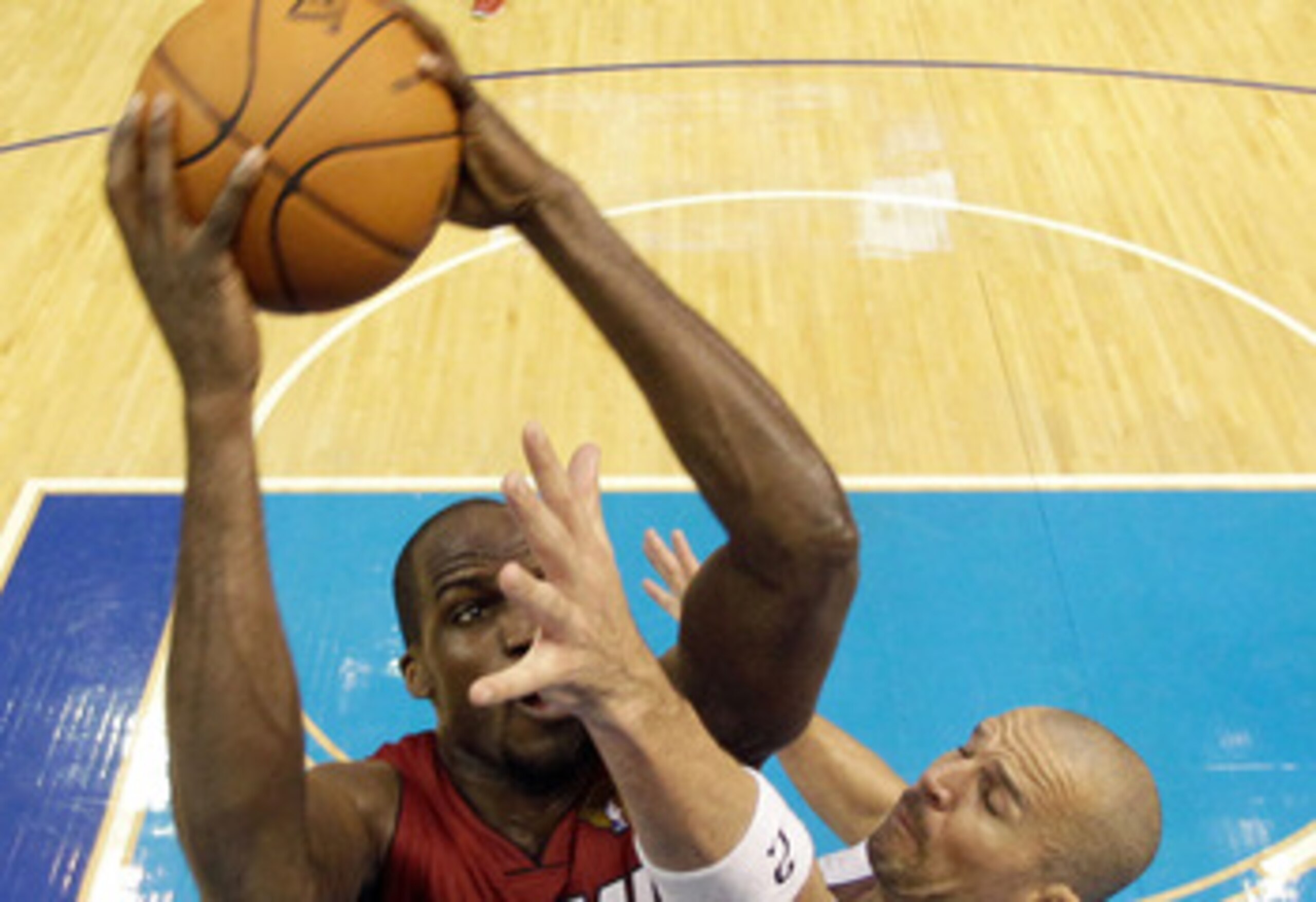 DALLAS, TX - JUNE 05:  Joel Anthony #50 of the Miami Heat attempts a shot against Jason Kidd #2 of the Dallas Mavericks in Game Three of the 2011 NBA Finals at American Airlines Center on June 5, 2011 in Dallas, Texas.  NOTE TO USER: User expressly acknow