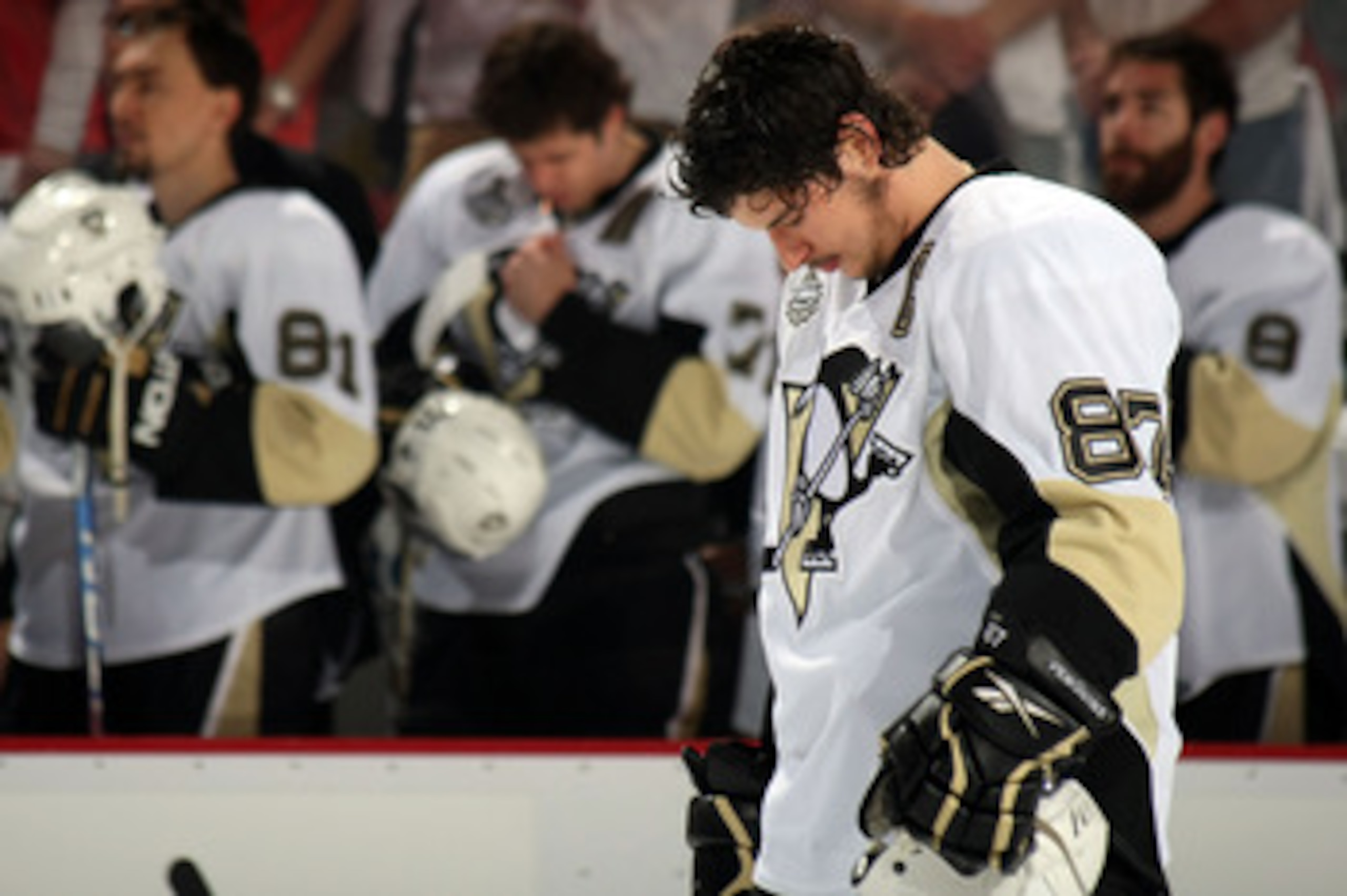 DETROIT - JUNE 12:  Sidney Crosby #87 of the Pittsburgh Penguins stands at attention during the National Anthem before playing against the Detroit Red Wings during Game Seven of the 2009 NHL Stanley Cup Finals at Joe Louis Arena on June 12, 2009 in Detroi