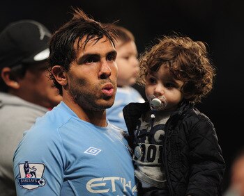 MANCHESTER, ENGLAND - MAY 17:  Carlos Tevez of Manchester City acknowledges the crowd after the Barclays Premier League match between Manchester City and Stoke City at City of Manchester Stadium on May 17, 2011 in Manchester, England.  (Photo by Shaun Bot