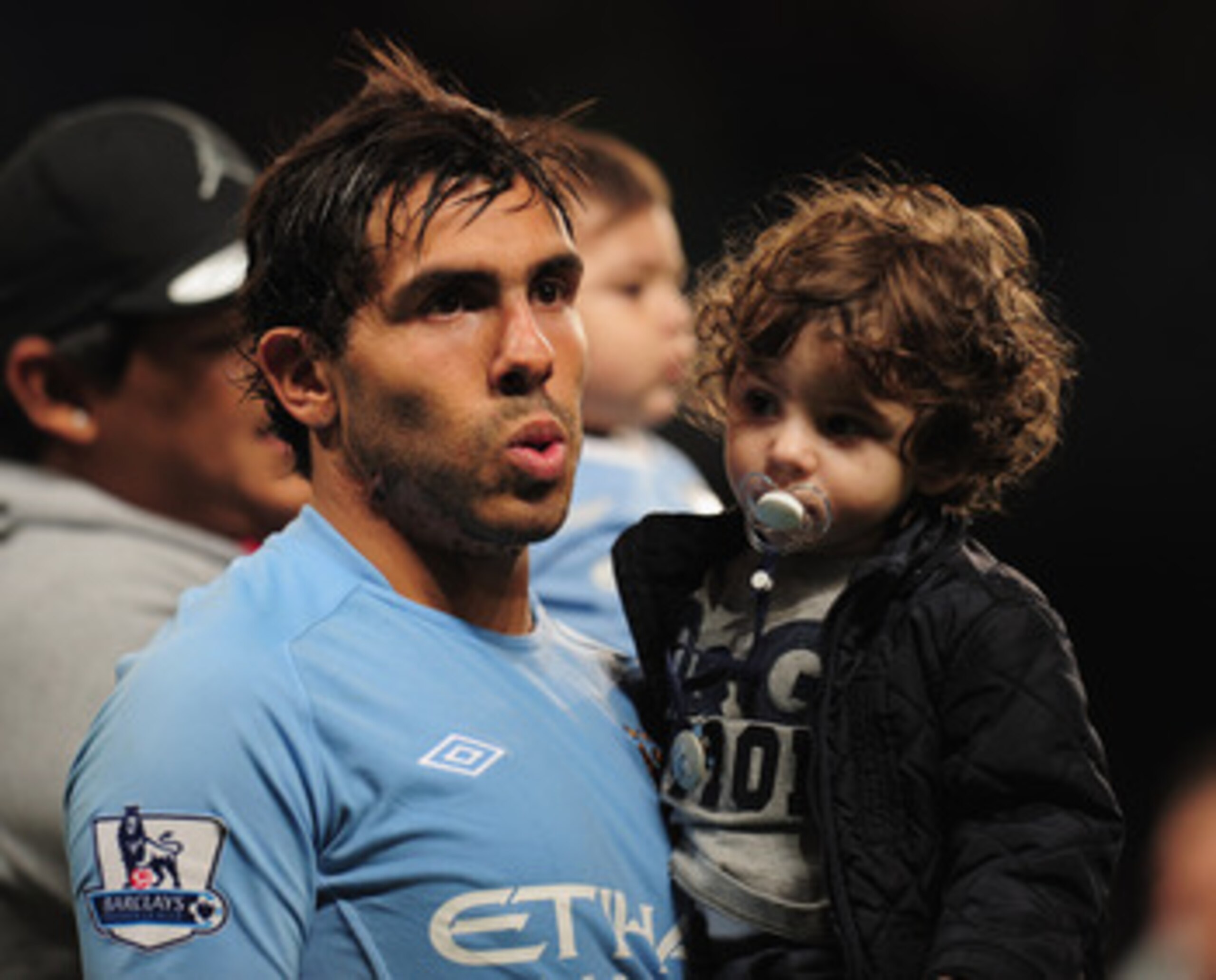 MANCHESTER, ENGLAND - MAY 17:  Carlos Tevez of Manchester City acknowledges the crowd after the Barclays Premier League match between Manchester City and Stoke City at City of Manchester Stadium on May 17, 2011 in Manchester, England.  (Photo by Shaun Bot