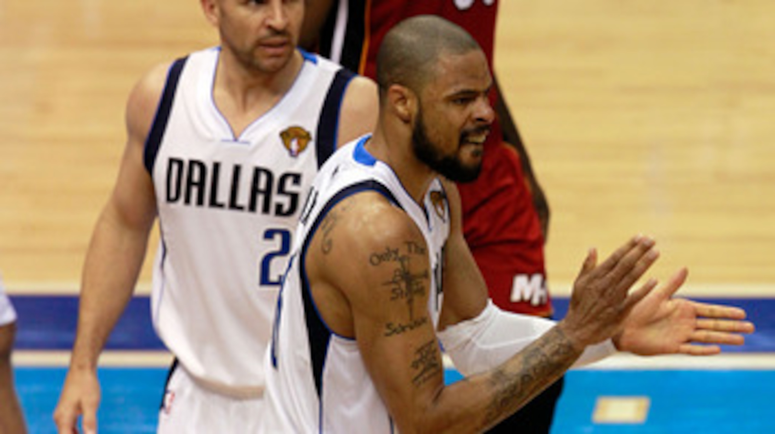 DALLAS, TX - JUNE 05:  (R) Tyson Chandler #6 of the Dallas Mavericks reacts in the third quarter while taking on the Miami Heat in Game Three of the 2011 NBA Finals at American Airlines Center on June 5, 2011 in Dallas, Texas.  NOTE TO USER: User expressl
