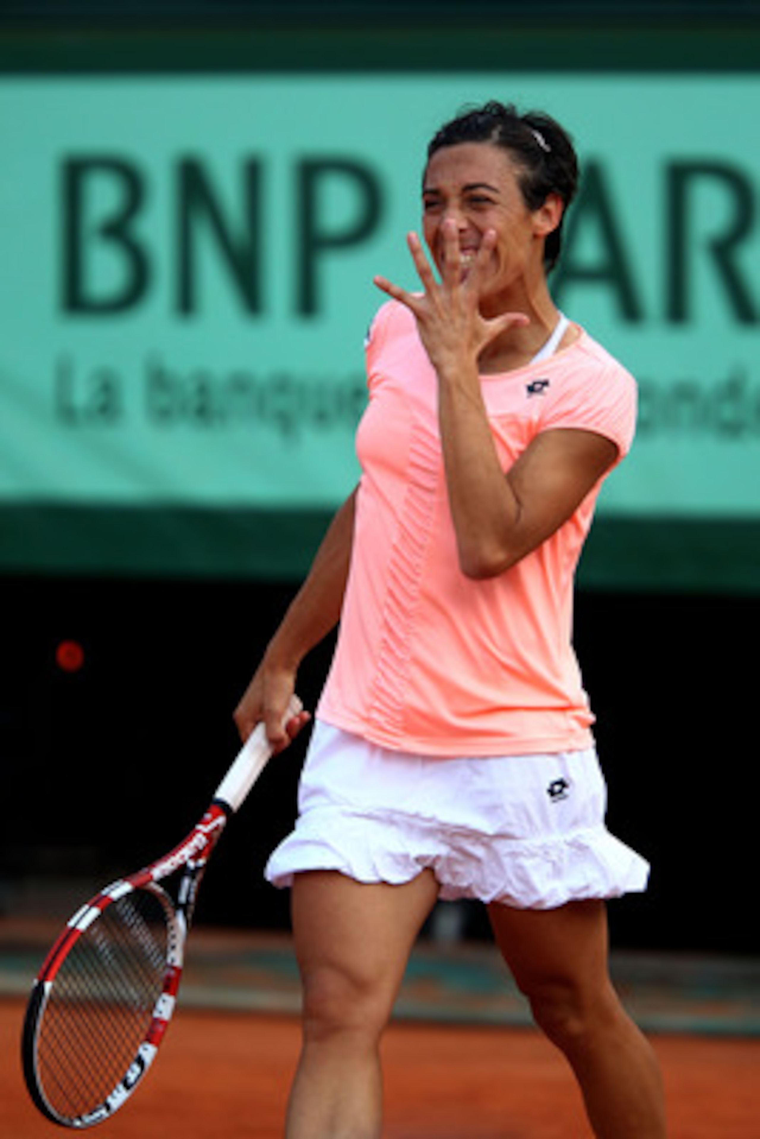 PARIS, FRANCE - JUNE 04:  Francesca Schiavone of Italy reacts during the women's singles final match between Francesca Schiavone of Italy and Na Li of China on day fourteen of the French Open at Roland Garros on June 4, 2011 in Paris, France.  (Photo by C