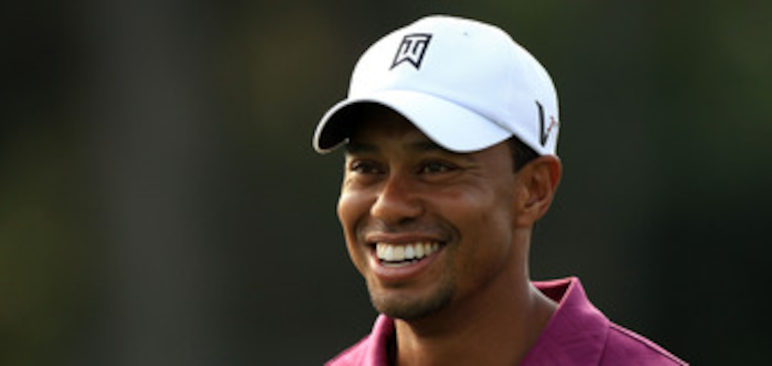 PONTE VEDRA BEACH, FL - MAY 11:  Tiger Woods smiles during a practice round prior to the start of THE PLAYERS Championship held at THE PLAYERS Stadium course at TPC Sawgrass on May 11, 2011 in Ponte Vedra Beach, Florida.  (Photo by Streeter Lecka/Getty Im