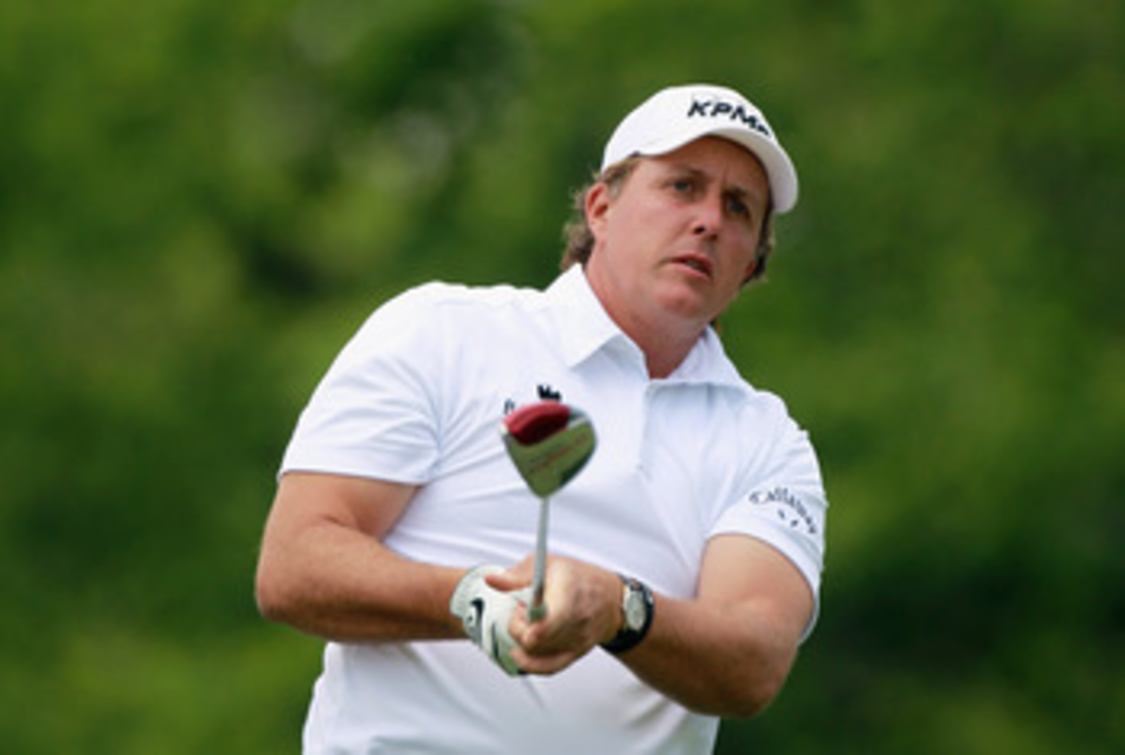 DUBLIN, OH - JUNE 03:  Phil Mickelson watches his tee shot on the first hole during the second round of the Memorial Tournament presented by Nationwide Insurance at the Muirfield Village Golf Club on June 3, 2011 in Dublin, Ohio.  (Photo by Scott Halleran