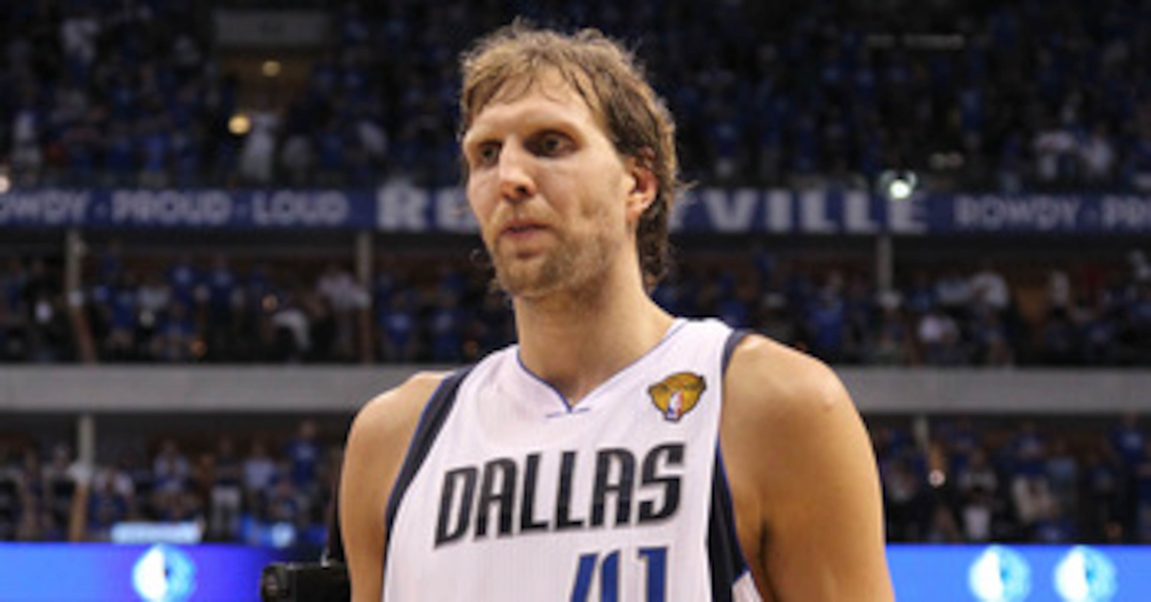 DALLAS, TX - JUNE 05:  Dirk Nowitzki #41 of the Dallas Mavericks walks off the court after being defeated 88-86 by the Miami Heat in Game Three of the 2011 NBA Finals at American Airlines Center on June 5, 2011 in Dallas, Texas.  NOTE TO USER: User expres