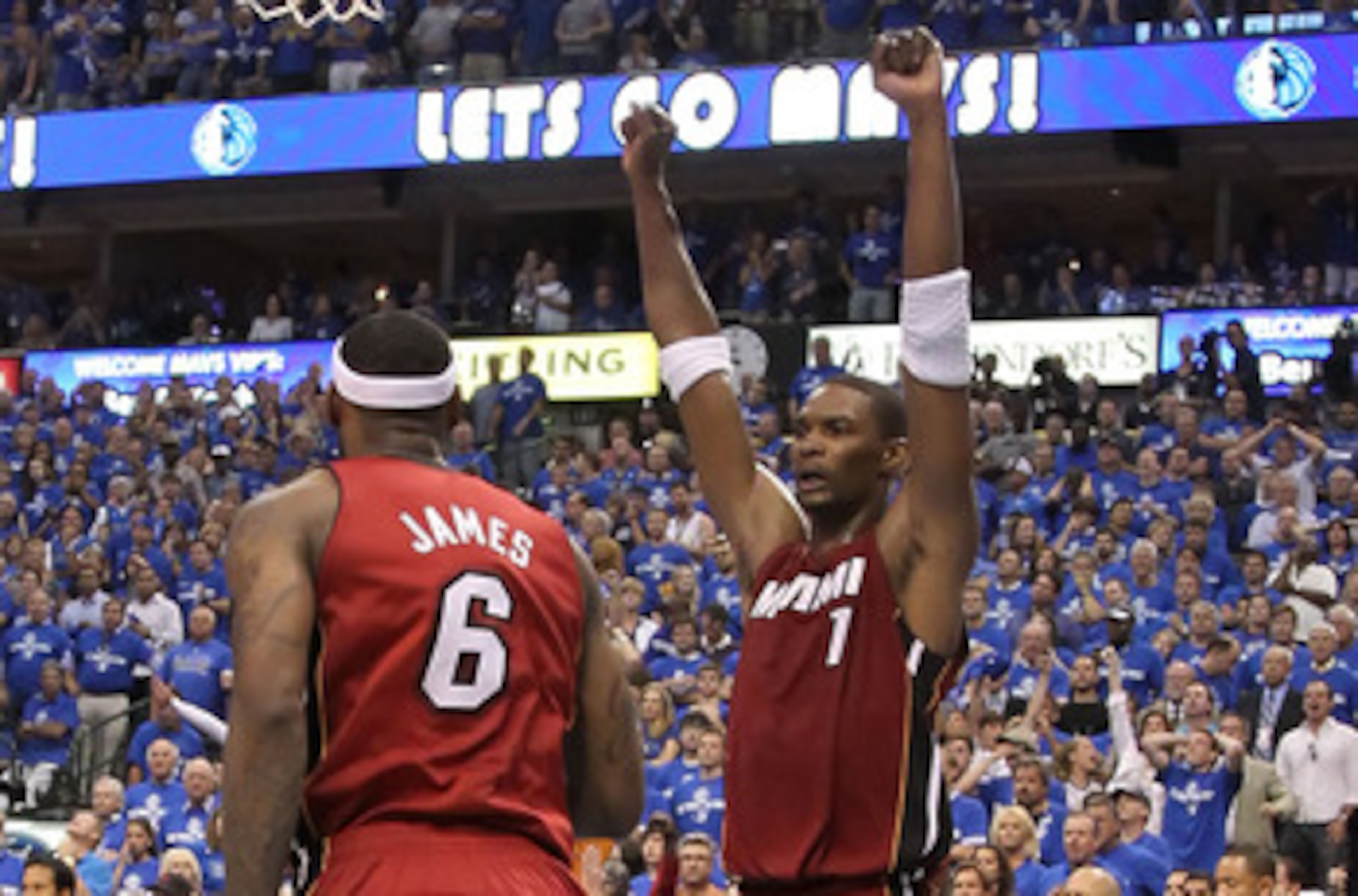 DALLAS, TX - JUNE 05: Chris Bosh #1 of the Miami Heat reacts late in the fourth quarter before the Heat defeated the Dallas Mavericks 88-86 in Game Three of the 2011 NBA Finals at American Airlines Center on June 5, 2011 in Dallas, Texas. NOTE TO USER: DALLAS, TX - JUNE 05: Chris Bosh #1 of the Miami Heat reacts late in the fourth quarter before the Heat defeated the Dallas Mavericks 88-86 in Game Three of the 2011 NBA Finals at American Airlines Center on June 5, 2011 in Dallas, Texas. NOTE TO USER: