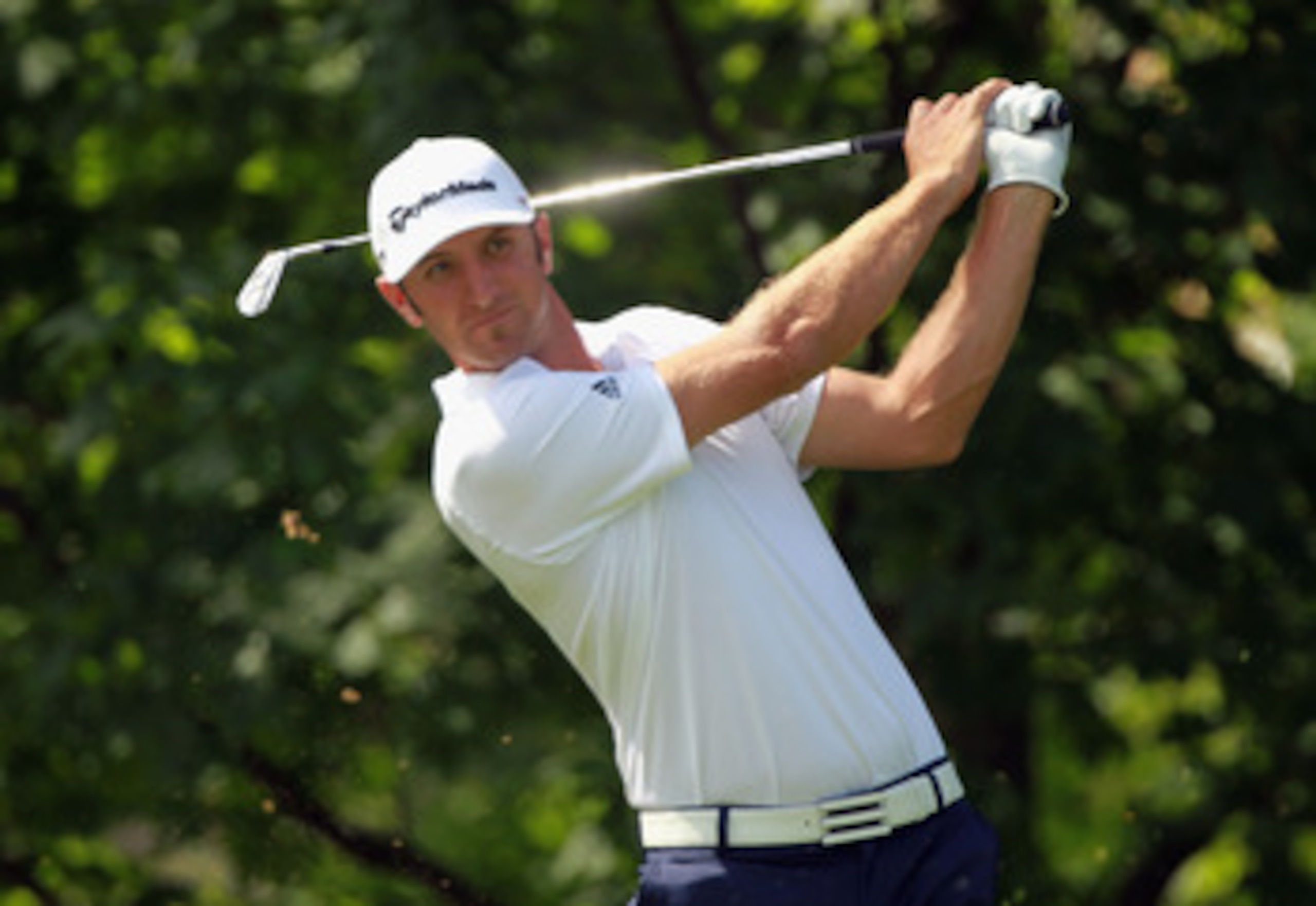 DUBLIN, OH - JUNE 02:  Dustin Johnson hits his tee shot on the 14th hole during the first round of the Memorial Tournament presented by Nationwide Insurance at the Muirfield Village Golf Club on June 2, 2011 in Dublin, Ohio.  (Photo by Scott Halleran/Gett