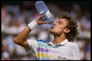 Jun 1989:  Mats  Willander of Sweden takes a water break during the Wimbledon tennis championships at the all England club in London.                                                                                Mandatory Credit: Allsport UK