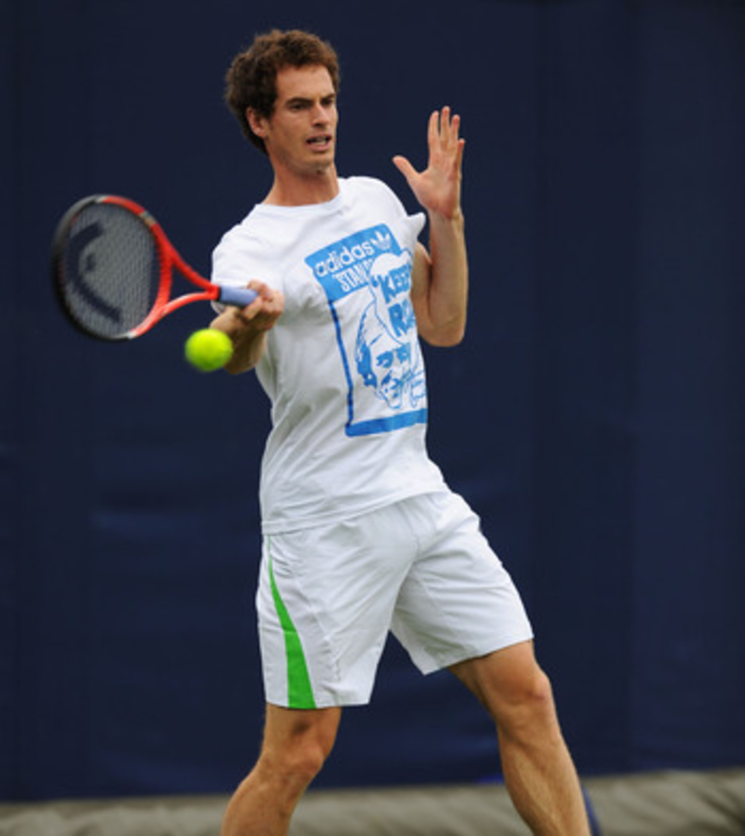 LONDON, ENGLAND - JUNE 06:  Andy Murray of Great Britain returns a shot during practice on day one of the AEGON Championships at Queens Club on June 6, 2011 in London, England.  (Photo by Michael Regan/Getty Images)