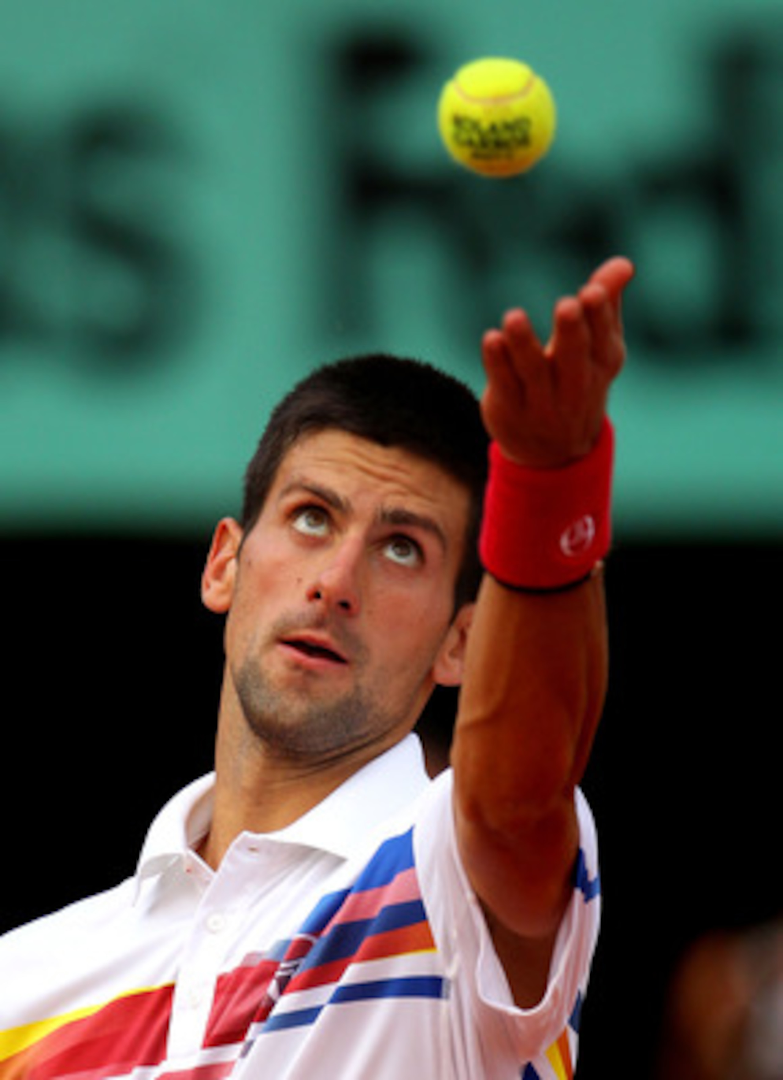 PARIS, FRANCE - JUNE 03:  Novak Djokovic of Serbia serves during the men's singles semi final match between Roger Federer of Switzerland and Novak Djokovic of Serbia on day thirteen of the French Open at Roland Garros on June 3, 2011 in Paris, France.  (P