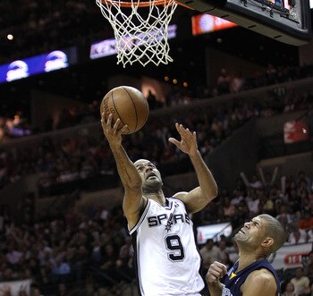 SAN ANTONIO, TX - APRIL 27:  Tony Parker #9 of the San Antionio Spurs shoots over Shane Battier #31 of the Memphis Grizzlies in Game Five of the Western Conference Quarterfinals in the 2011 NBA Playoffs on April 27, 2011 at AT&T Center in San Antonio, Tex