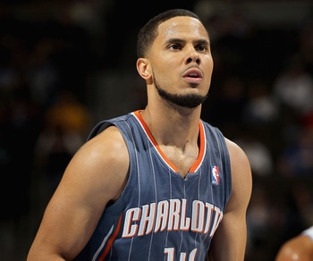 DENVER, CO - MARCH 02:  D.J. Augustin #14 of the Charlotte Bobcats takes a free throw against the Denver Nuggets at the Pepsi Center on March 2, 2011 in Denver, Colorado. The Nuggets defeated the Bobcats 120-80.NOTE TO USER: User expressly acknowledges an