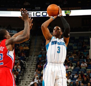 NEW ORLEANS - NOVEMBER 09:  Chris Paul #3 of the New Orleans Hornets shoots the ball over Eric Bledsoe #12 of the Los Angeles Clippers at the New Orleans Arena on November 9, 2010 in New Orleans, Louisiana.  NOTE TO USER: User expressly acknowledges and a