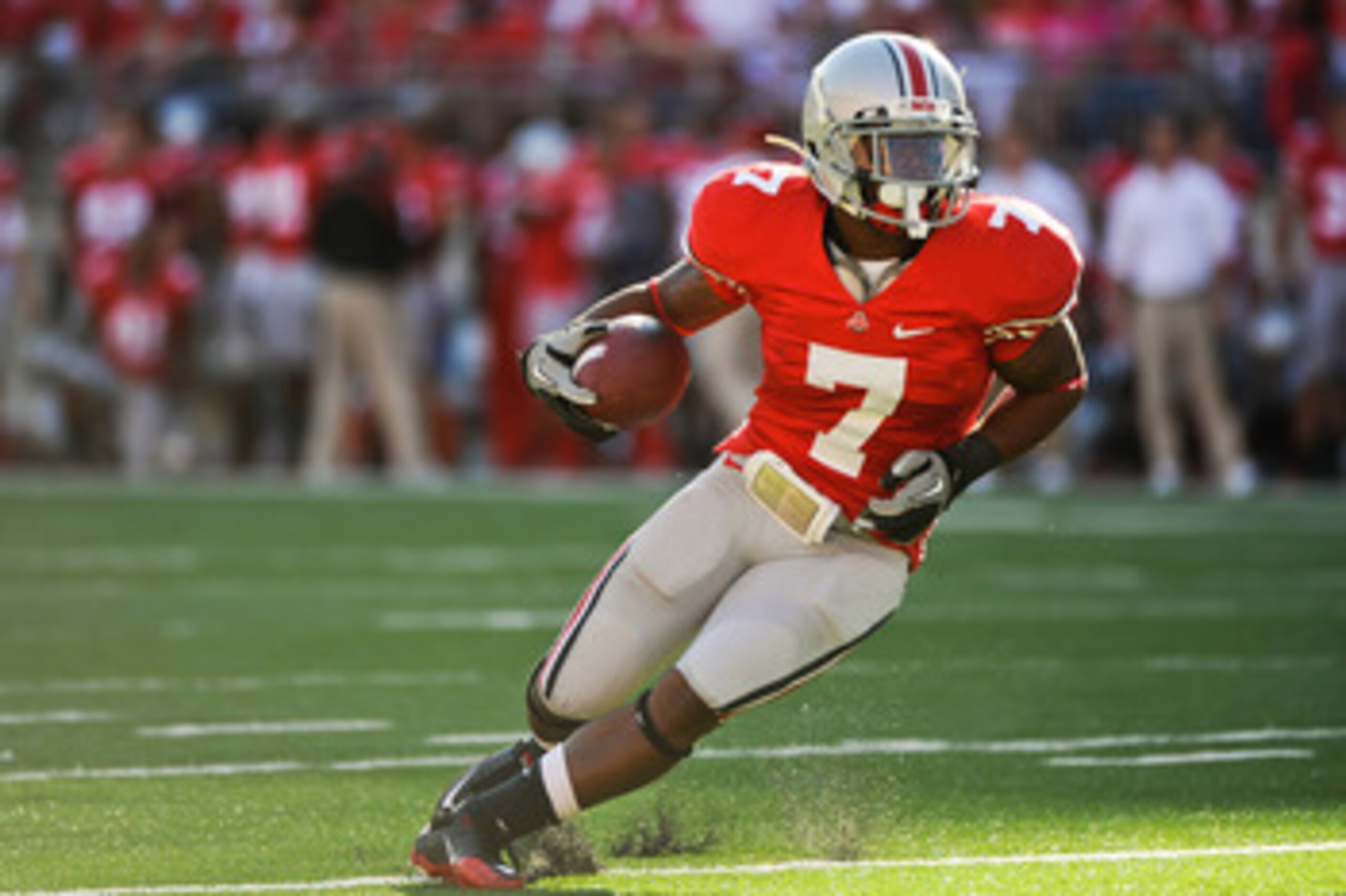 COLUMBUS, OH - SEPTEMBER 25:  Jordan Hall #7 of the Ohio State Buckeyes runs with the ball against the Eastern Michigan Eagles at Ohio Stadium on September 25, 2010 in Columbus, Ohio.  Ohio State won 73-20. (Photo by Jamie Sabau/Getty Images)