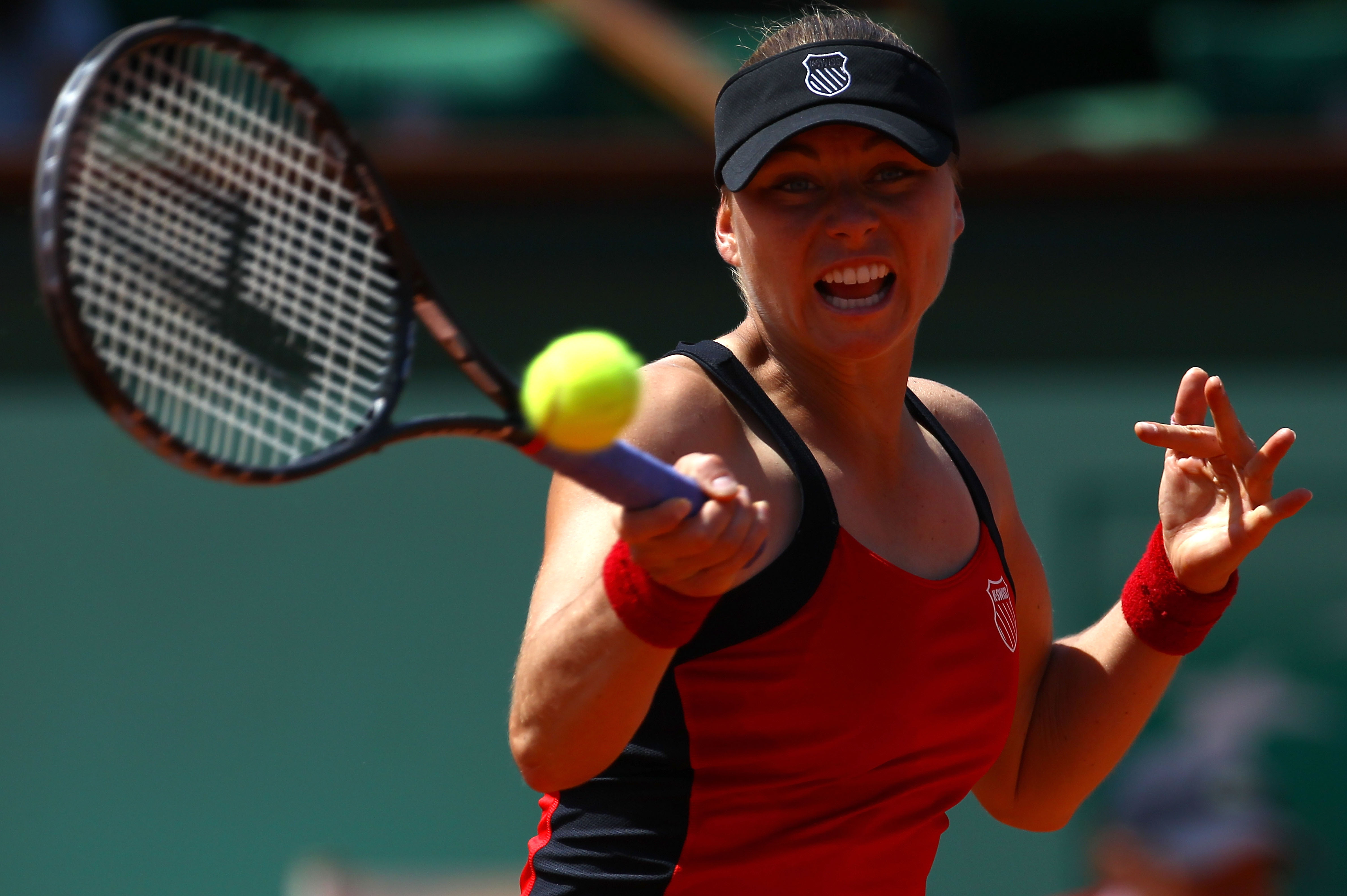 PARIS, FRANCE - MAY 29:  Vera Zvonareva of Russia hits a forehand during the women's singles round four match between Vera Zvonareva of Russia and Anastasia Pavlyuchenkova of Russia on day eight of the French Open at Roland Garros on May 29, 2011 in Paris